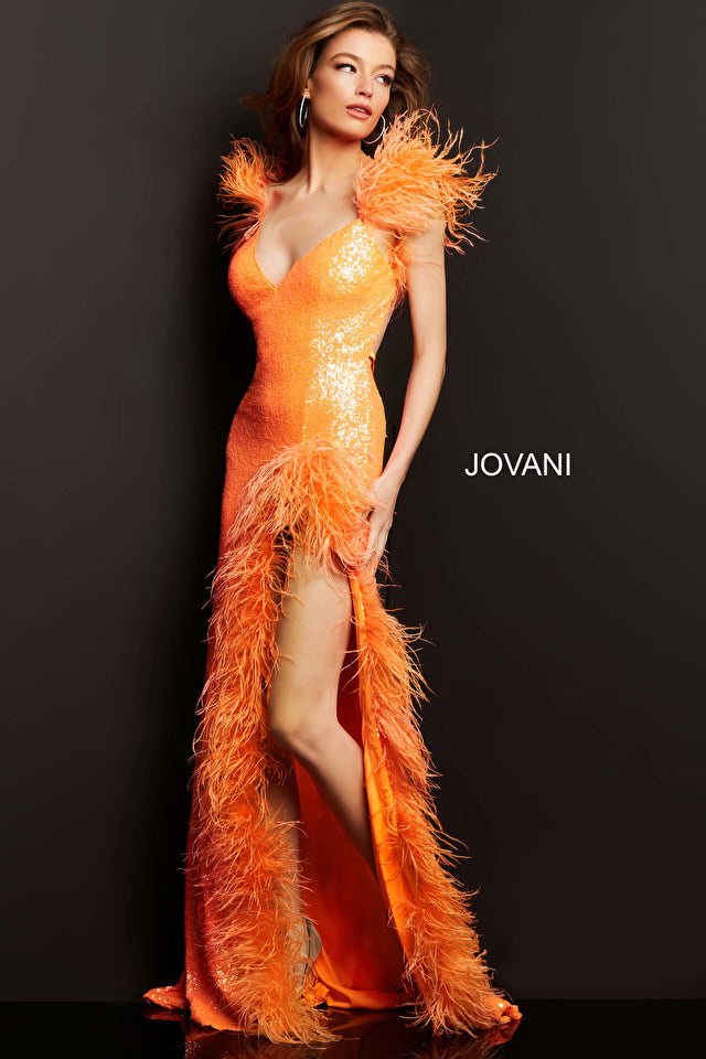 Dazzle everyone in the room with Jovani 06164 Fitted Sequin Prom Dress. This stunning prom dress is the epitome of glamor and sophistication. The floor-length skirt features a train and a high slit trimmed with delicate feathers, adding an ethereal touch to the dress. The sleeveless bodice is adorned with shimmering sequins and features a low V-neckline perfect for showcasing your décolletage. 