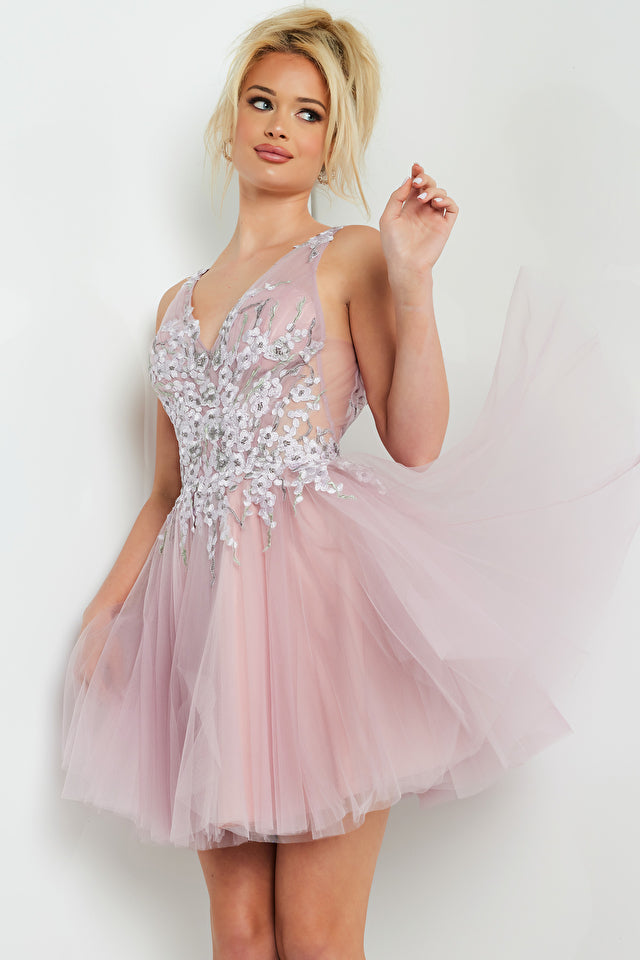 Look your best in this luxurious Jovani 09518 mauve dress. Its flattering fit and flare design and unique V-neckline and open back create an attractive aesthetic. Whether you're attending a formal event or a homecoming party, this dress will have you standing out from the crowd.