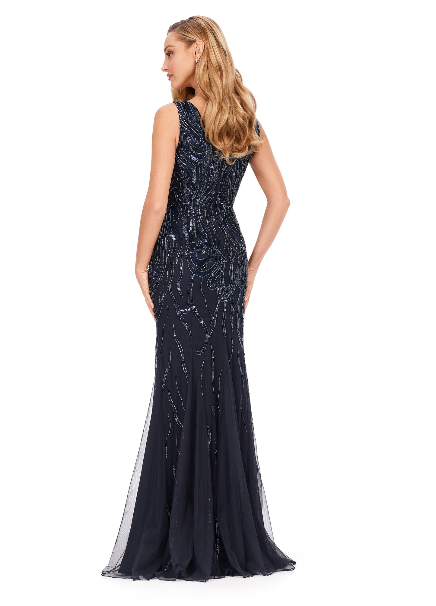 Ashley Lauren 11204 V-Neck Sequin V-Back Hand Beaded Sheer Long Evening Dress. This classic fitted gown features a v-neckline, v-back and a flattering bead pattern.