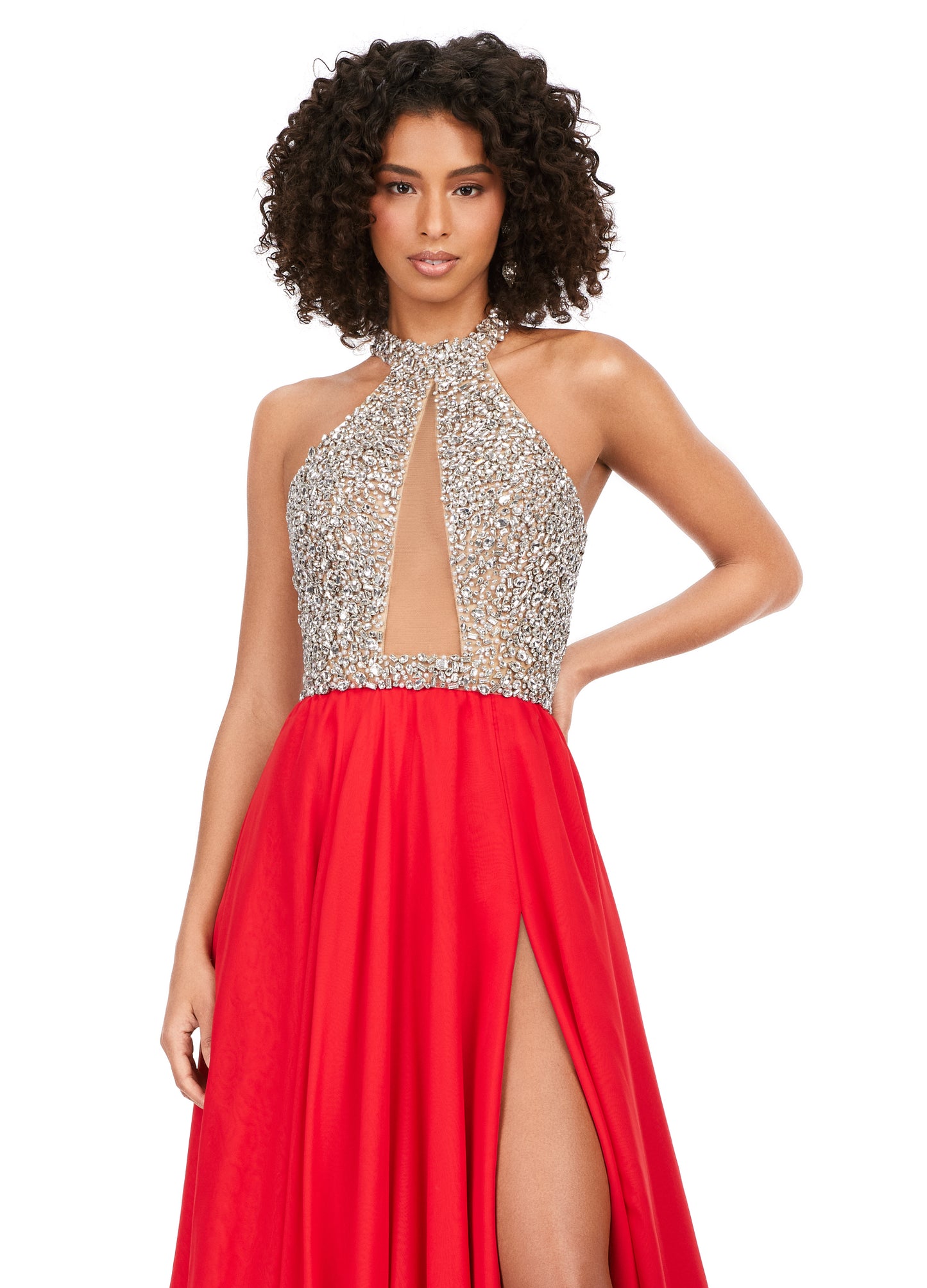 Ashley Lauren 11248 Chiffon Crystal Gown Beaded Bustier Maxi Slit Cross Back Halter Neckline A-Line Formal Dress. This chiffon A-line gown features a beautifully beaded halter top that is sure to shine bright at any event. The look is complete with an illusion cut out and high left leg slit.