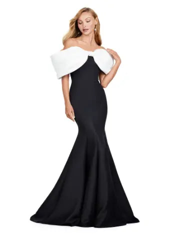 Experience elegance with the Ashley Lauren 11413 Long Prom Dress. Designed with an off-shoulder neckline, this dress is crafted from luxurious double-faced satin and features an oversized bow for added drama. Perfect for formal events and pageants, this dress will make you stand out with its sophisticated and flattering silhouette. Talk about elegant. This off shoulder gown is complete with an oversized bow along the neckline. This double faceted satin gown has a mermaid silhouette.