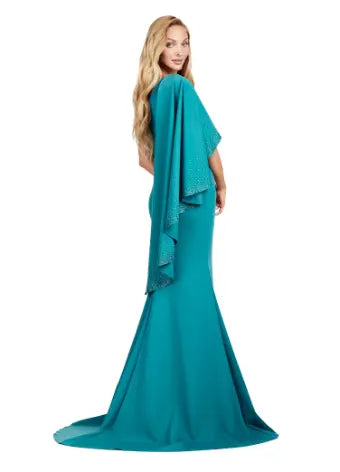 Elevate your formal ensemble with the Ashley Lauren 11421 Long Prom Dress. This fitted one shoulder gown features cascading ruffle sleeves, adding an elegant touch to your look. Perfect for pageants and prom, this dress is sure to make a statement. Expertly crafted for a flawless fit. This dress is all about classic elegance. The one shoulder design features a cascading ruffle sleeve with press on stone details.