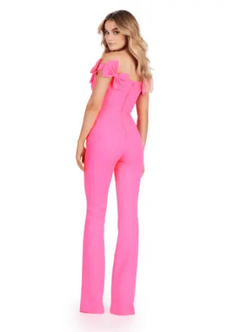 Introducing the Ashley Lauren 11439 Formal Scuba Jumpsuit, featuring a beautiful off shoulder design with elegant bow details. Made with high-quality scuba fabric, this jumpsuit offers a comfortable and sleek fit for any prom or formal occasion. Show off your fashion-forward style with this must-have piece. Strike a pose in this fun-fashion scuba jumpsuit! With the cutest off shoulder bow sleeves, this piece will give you the confidence you need at any event!