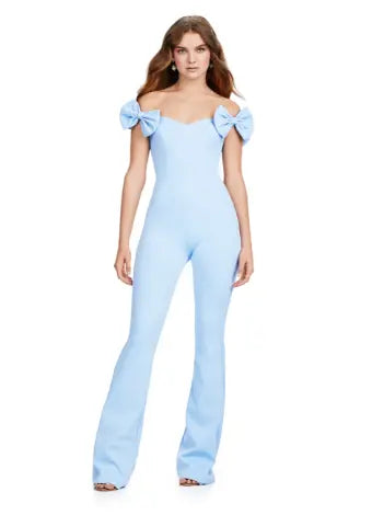 Introducing the Ashley Lauren 11439 Formal Scuba Jumpsuit, featuring a beautiful off shoulder design with elegant bow details. Made with high-quality scuba fabric, this jumpsuit offers a comfortable and sleek fit for any prom or formal occasion. Show off your fashion-forward style with this must-have piece. Strike a pose in this fun-fashion scuba jumpsuit! With the cutest off shoulder bow sleeves, this piece will give you the confidence you need at any event!