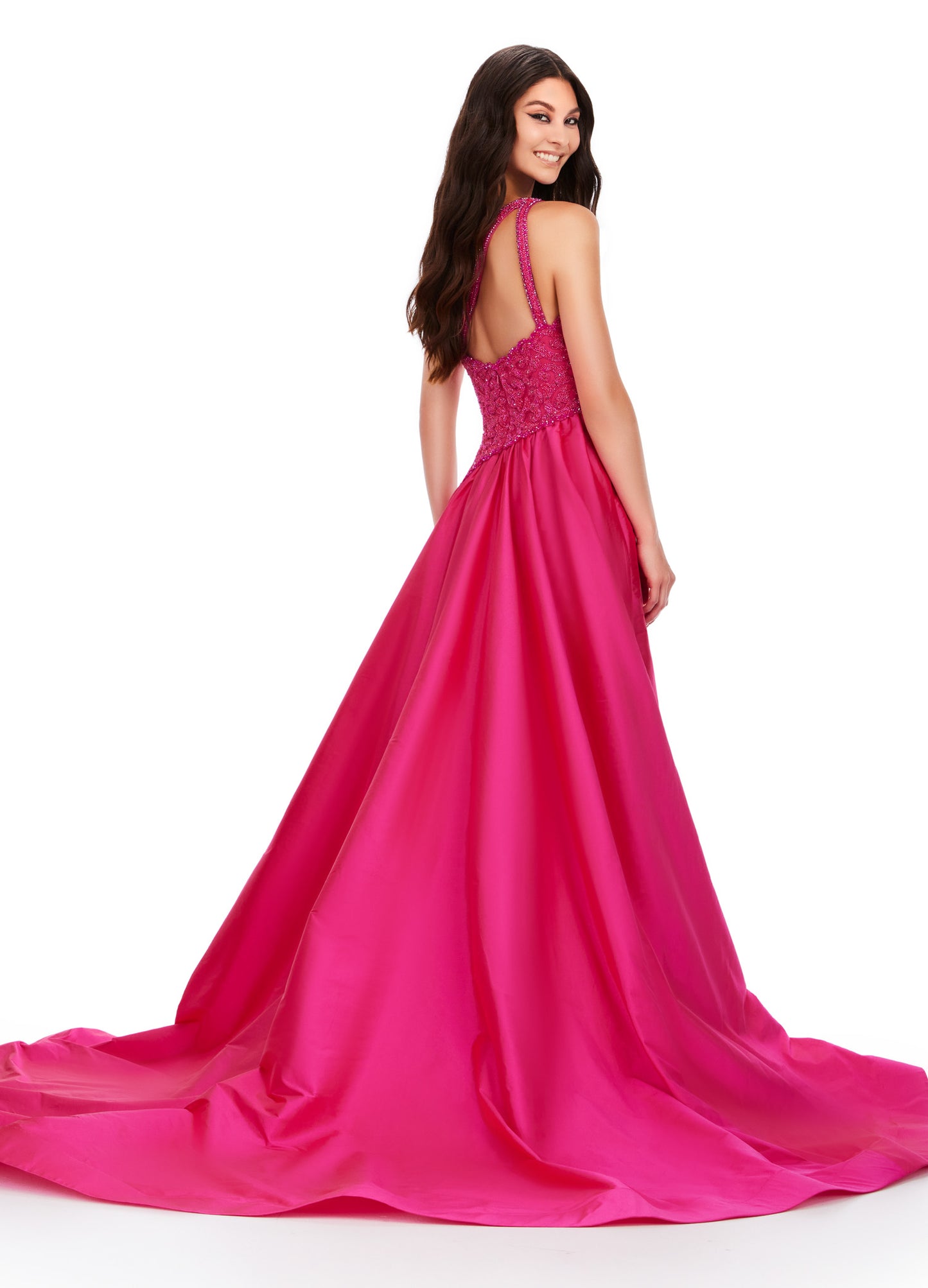 This Ashley Lauren 11456 Long Prom Dress features a one shoulder design with a beautiful taffeta fabric and a stunning beaded bodice. Elevate your formal look with this pageant-worthy gown. Expertly crafted with attention to detail, this dress is sure to make a statement. A dress sure to make you feel like royalty! This one shoulder gown features a fully beaded bodice and a dramatic taffeta overskirt.