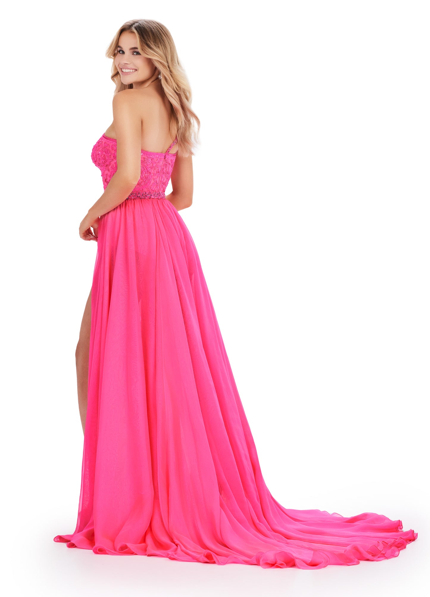 Expertly crafted for maximum impact, the Ashley Lauren 11460 Long Prom Dress is a show-stopping choice for any formal event. The one shoulder beaded bodysuit adds a touch of glamour, while the chiffon overskirt exudes elegance. Trust in Ashley Lauren's expertise for a flawless look. Dare to be different in this fabulous one shoulder beaded bodysuit with a detached chiffon overskirt. The skirt features a waist-high slit to give that perfect amount of drama!