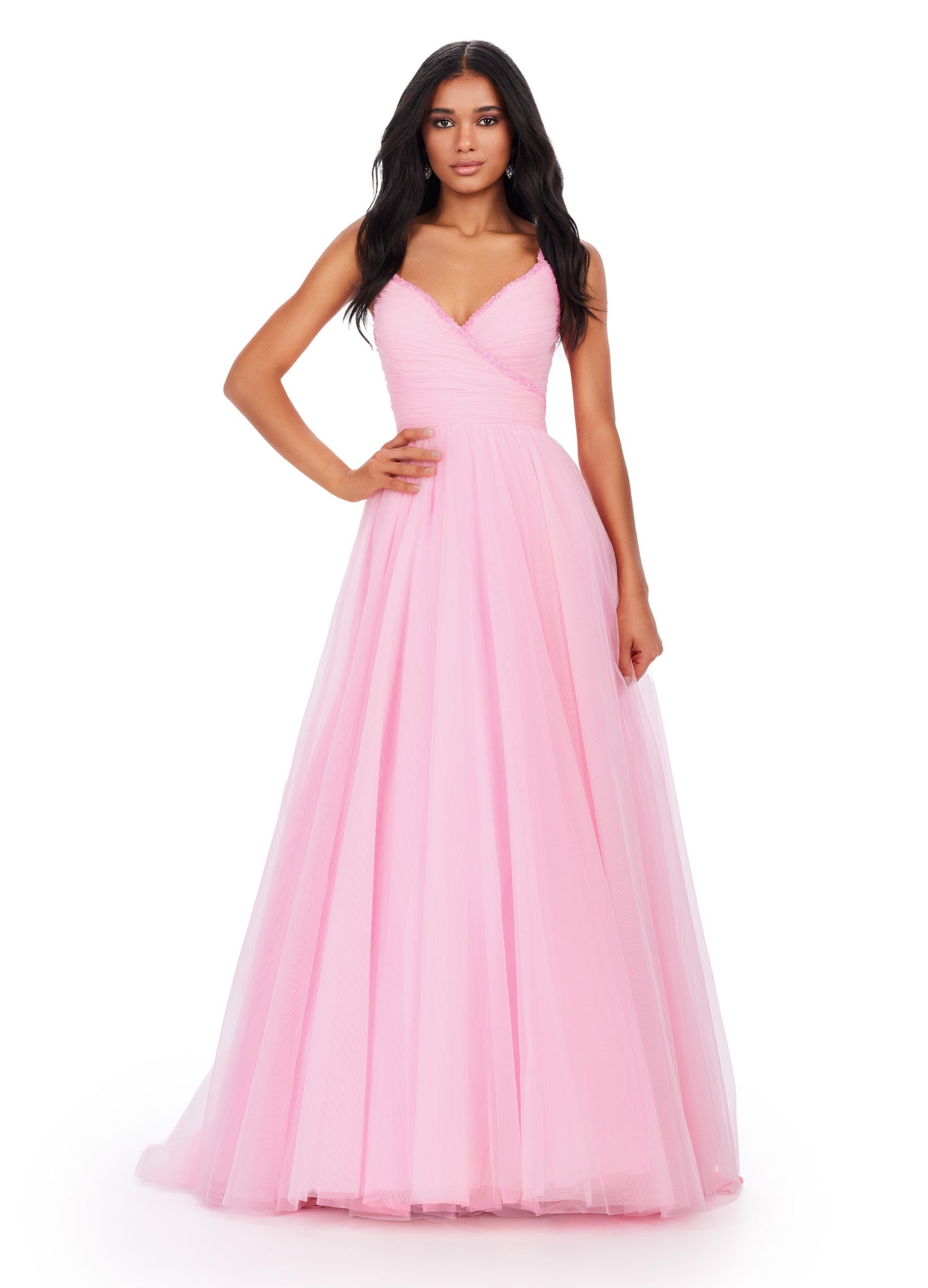 The Ashley Lauren 11461 Long Prom Dress is the perfect choice for your formal occasion. This elegant gown features delicate spaghetti straps and a tulle ball gown skirt for a timeless look. The intricate beaded detailing adds a touch of sparkle, making you stand out from the crowd. Experience the ultimate in luxury with this pageant-worthy dress. This simplistic ball gown features dainty beaded spaghetti straps with a ruched bodice.