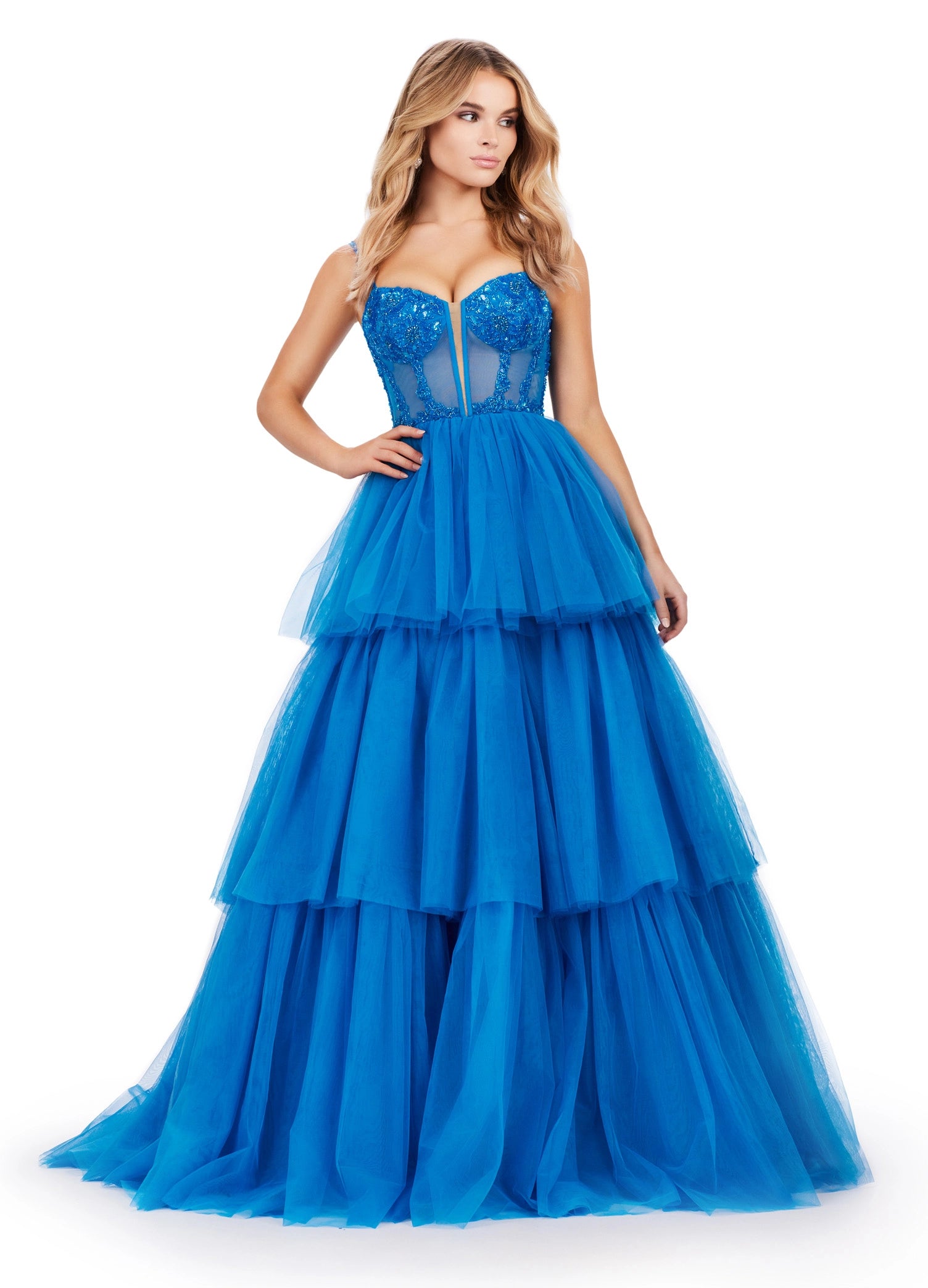 The Ashley Lauren 11462 Sheer Beaded Corset Layer Tulle Prom Dress Ballgown Pageant Tiered Gown is a statement-making piece. Crafted from sheer corset layers, delicate beadwork, and tiered tulle, it's perfect for any special occasion. Elegant and eye-catching, this dress features the perfect balance of comfort and sophistication.