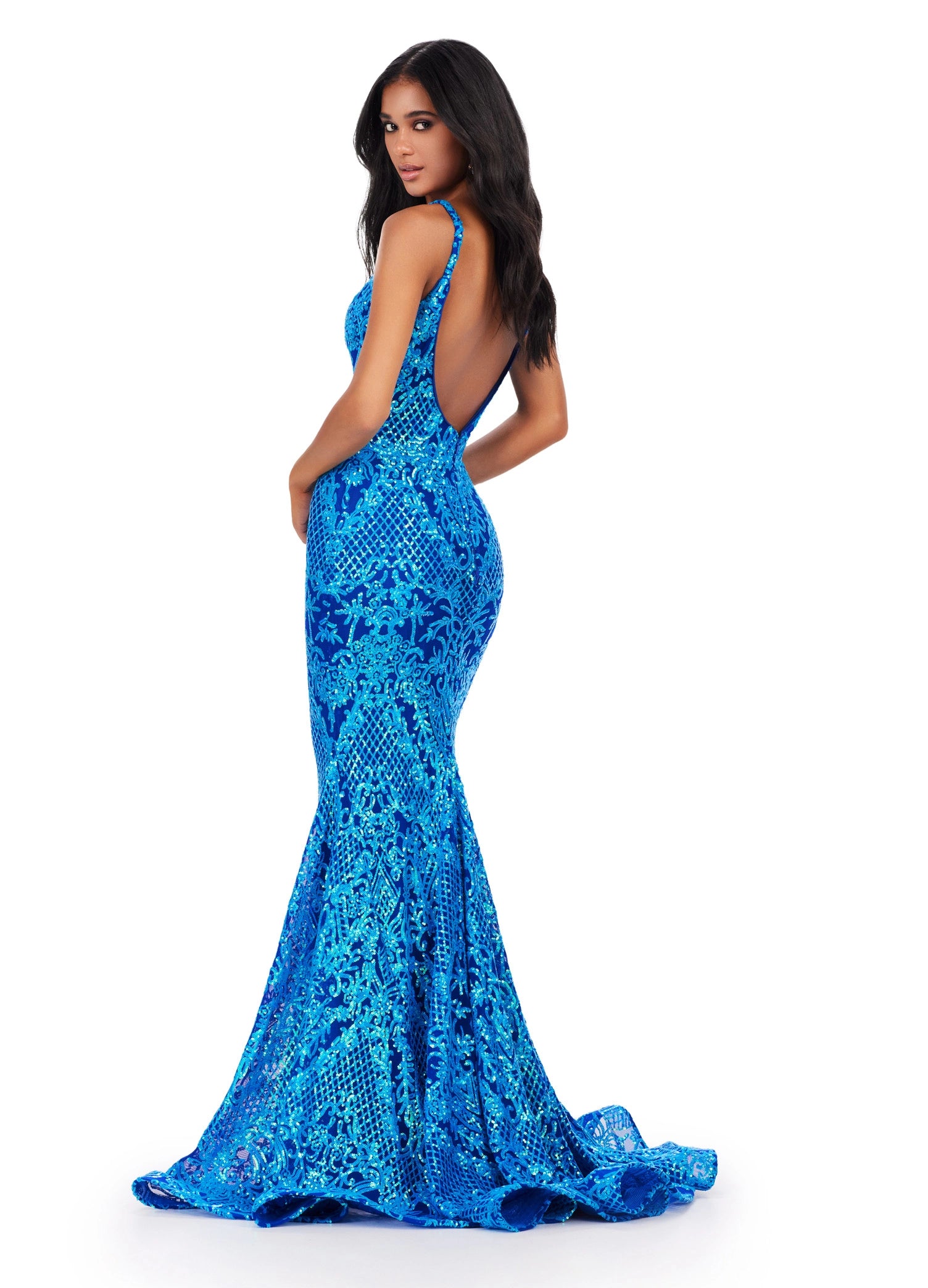 This eye-catching Ashley Lauren 11466 Long Sequin Mermaid Prom Dress is sure to make a statement. The glamorous V-neck, backless design, and long mermaid skirt make this the ultimate formal gown. Perfect for making a lasting impression. A dress perfect for any event. This intricate stretch sequin gown features a V-Neckline and a low cut back.