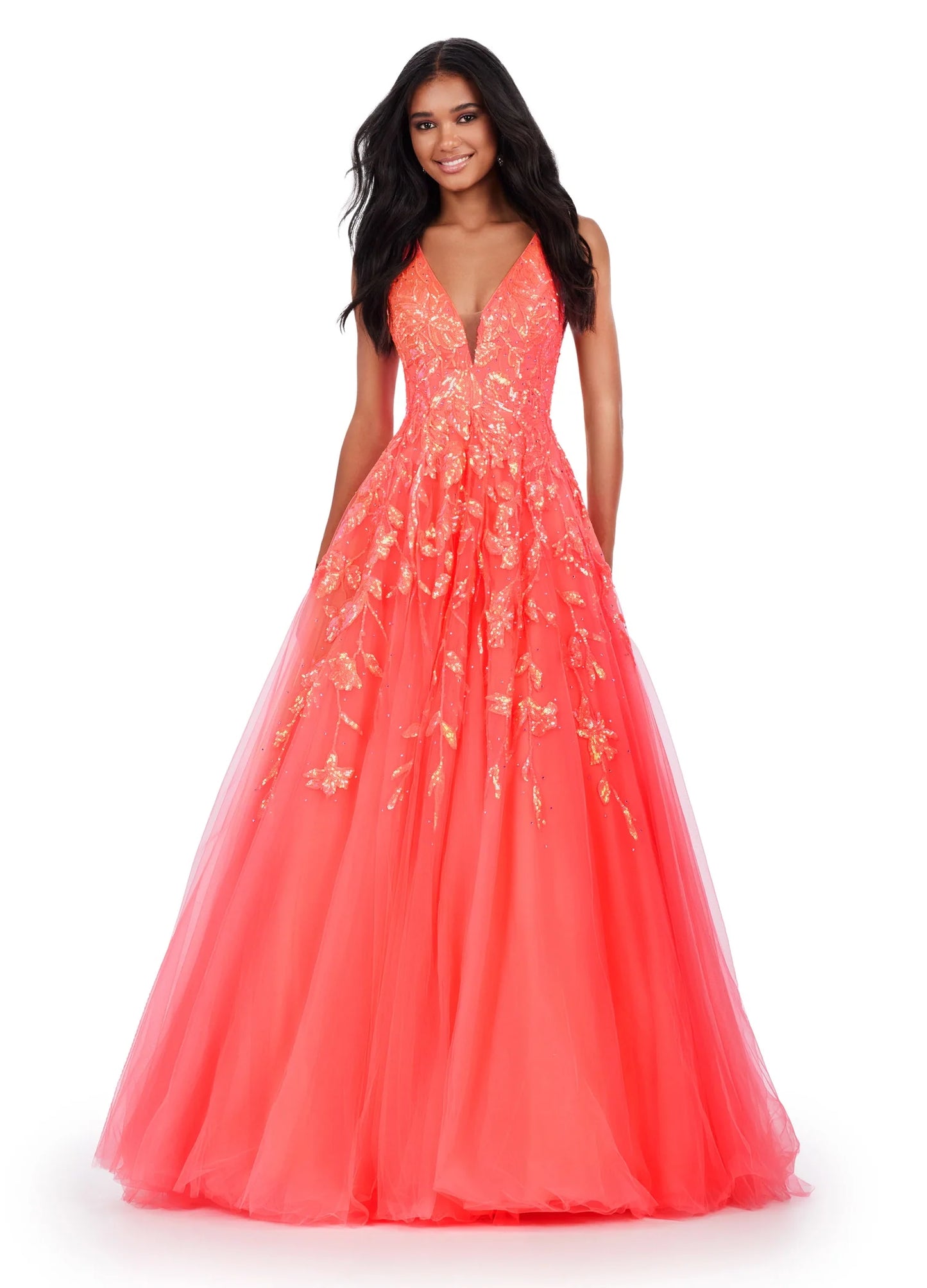 This Ashley Lauren 11470 Prom Dress will make a statement at any occasion. Made with sequin fabric and a pleated tulle skirt, the A-line silhouette will flatter any body shape, while the V-neckline adds a touch of sophistication. This glamorous gown is the perfect choice for making a lasting impression. 