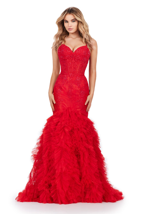 Expertly designed by Ashley Lauren, this long prom dress features a stunning mermaid silhouette with spaghetti straps and a corset bustier. The ruffled tulle skirt adds a touch of romance to this formal pageant gown. Be the center of attention at your special event. This mermaid gown is what dreams are made of! With its lace details, exposed corset bustier and full ruffled tulle skirt, this dress is sure to impress!