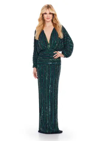 Be the star of any event with the Ashley Lauren 11490 Long Prom Dress. Its stunning V-neck, sequin detailing, and dolman sleeves add the perfect touch of glamour. This elegant evening gown is also perfect for formal events, pageants, and more. Make a statement with this timeless and sophisticated piece. Fun and fabulous! This elegant, fully beaded gown features a v-neckline and dolman sleeves to give the perfect amount of glam at your next event.