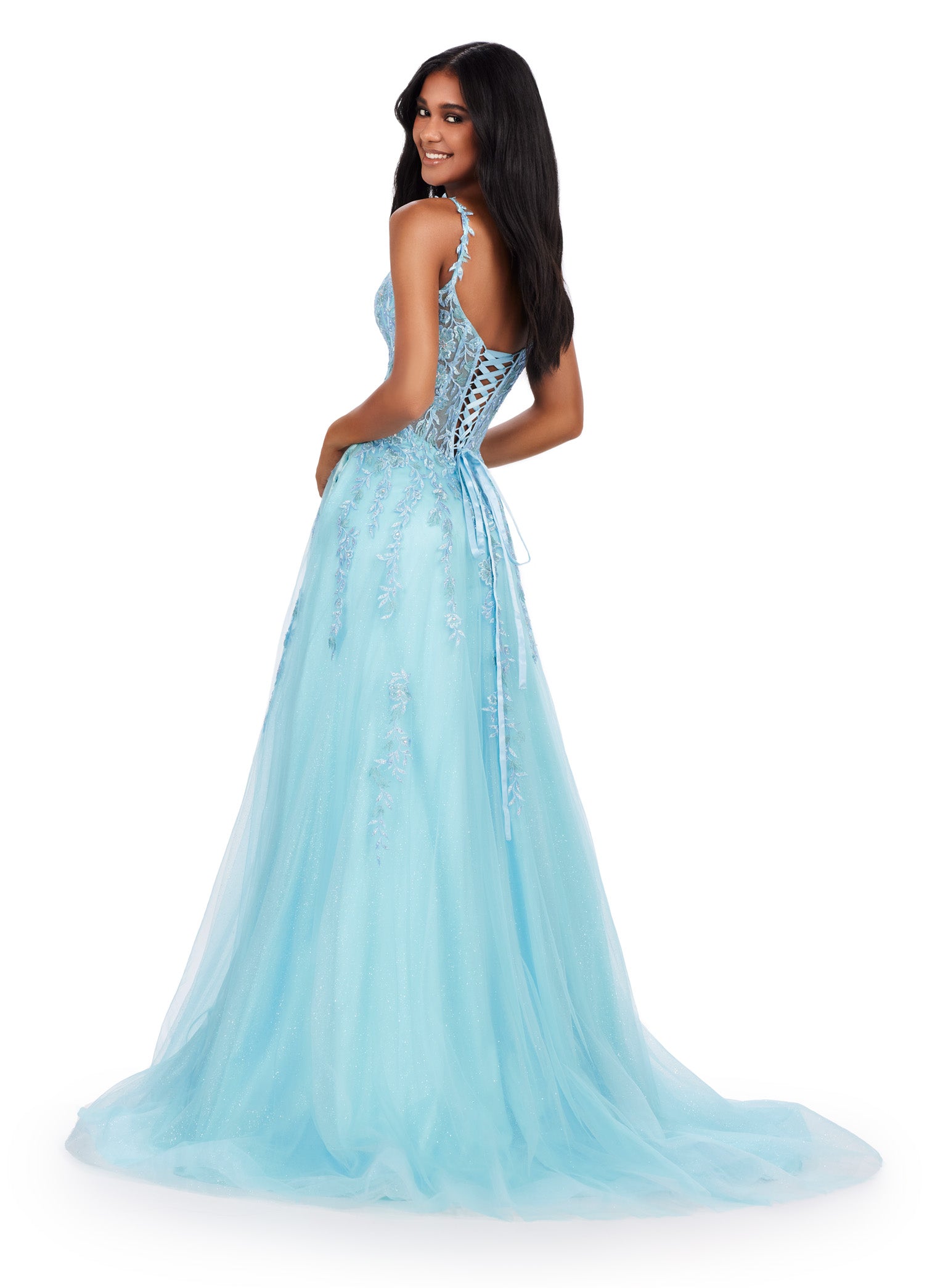 Step into the spotlight in the Ashley Lauren 11526 Long Prom Dress. Featuring spaghetti straps, a V-neckline, and a glitter tulle skirt, this gown is perfect for any formal event or pageant. With its elegant design and flattering silhouette, you'll feel like a star all night long. Living in a fairytale! This spaghetti strap gown features a v neckline with a lace applique bodice. The lace up back and glitter tulle skirt complete the look.