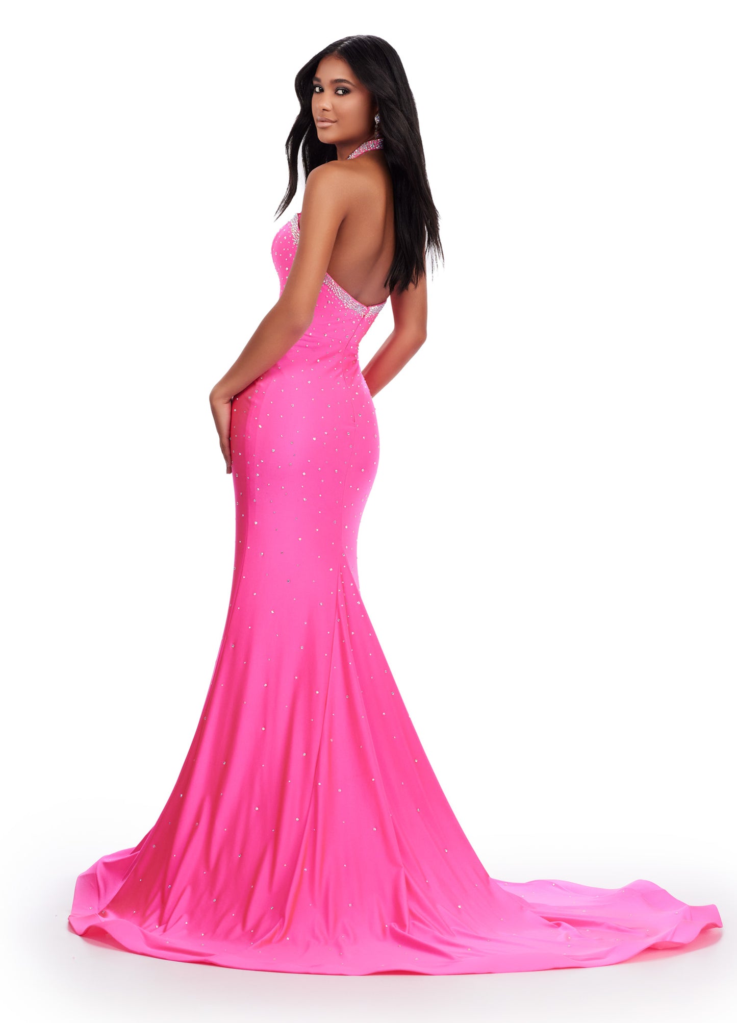 Be the star of the prom with the Ashley Lauren 11578 Long Prom Dress. Designed with a mermaid silhouette and cut-outs, this elegant gown is made of high-quality jersey fabric. The dress also features press on stones, adding a touch of glamour. Perfect for formal events and pageants. Dance the night away in this edgy and fabulous jersey gown. This dress features a halter design with cut outs and press on stones make this dress stand out.