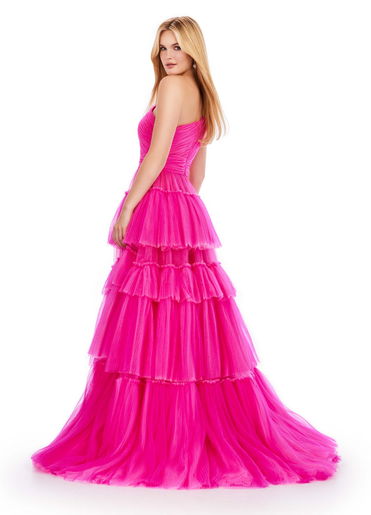 Turn heads at prom or pageants with the Ashley Lauren 11619 Long Prom Dress. This stunning two-tone tiered tulle ball gown features a sleek left leg slit, adding a touch of elegance to your look. Expertly crafted with top-quality materials, this dress is perfect for making a statement and feeling confident. Tiered dreams! This two-tone tired tulle ball gown features a one shoulder design and a left leg slit.