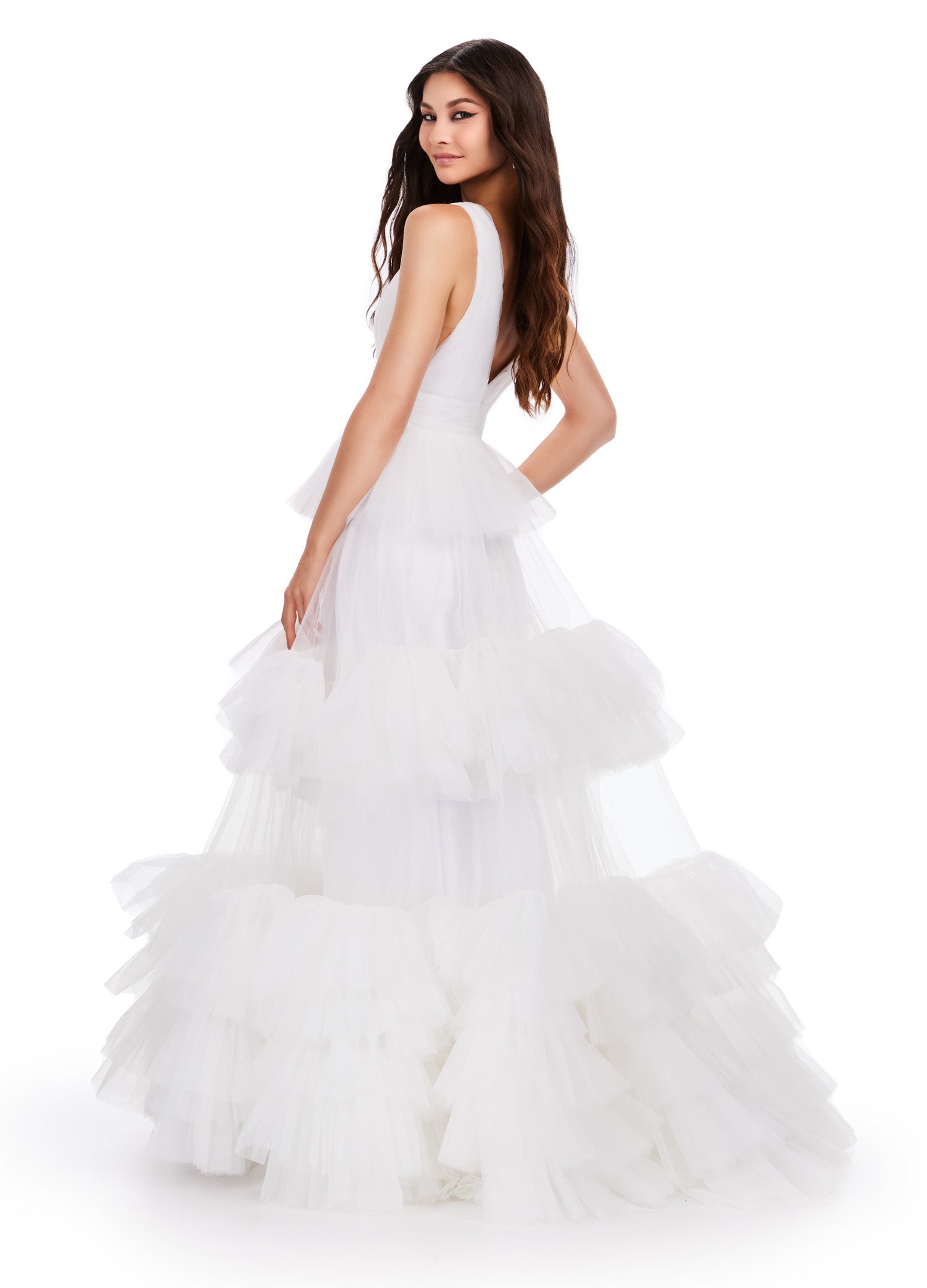 Elevate your formal wardrobe with the Ashley Lauren 11620 Long Prom Dress. Featuring a stunning V-neck, tiered tulle ball gown design, this dress will make you stand out at any event. Made with high-quality materials, it combines elegance and comfort for a truly unforgettable look. The dreamy ball gown features a v-neckline bustier accented by a multi-tiered tulle ruffle skirt.