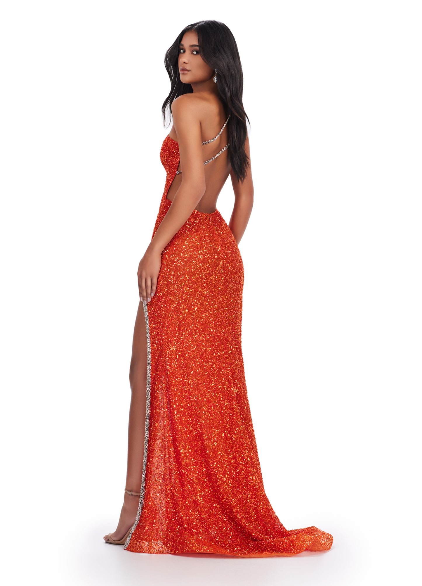 Elevate your formal event with the Ashley Lauren 11635 Prom Dress. This one-shoulder gown features intricate beading, an open back, and cut-out details for a stunning and unique look. Perfect for pageants, this dress will make you stand out with its sophisticated design. We're here for the glam! This fully beaded one shoulder gown features an asymmetric cut out. The open back and left leg slit takes this to the next level.