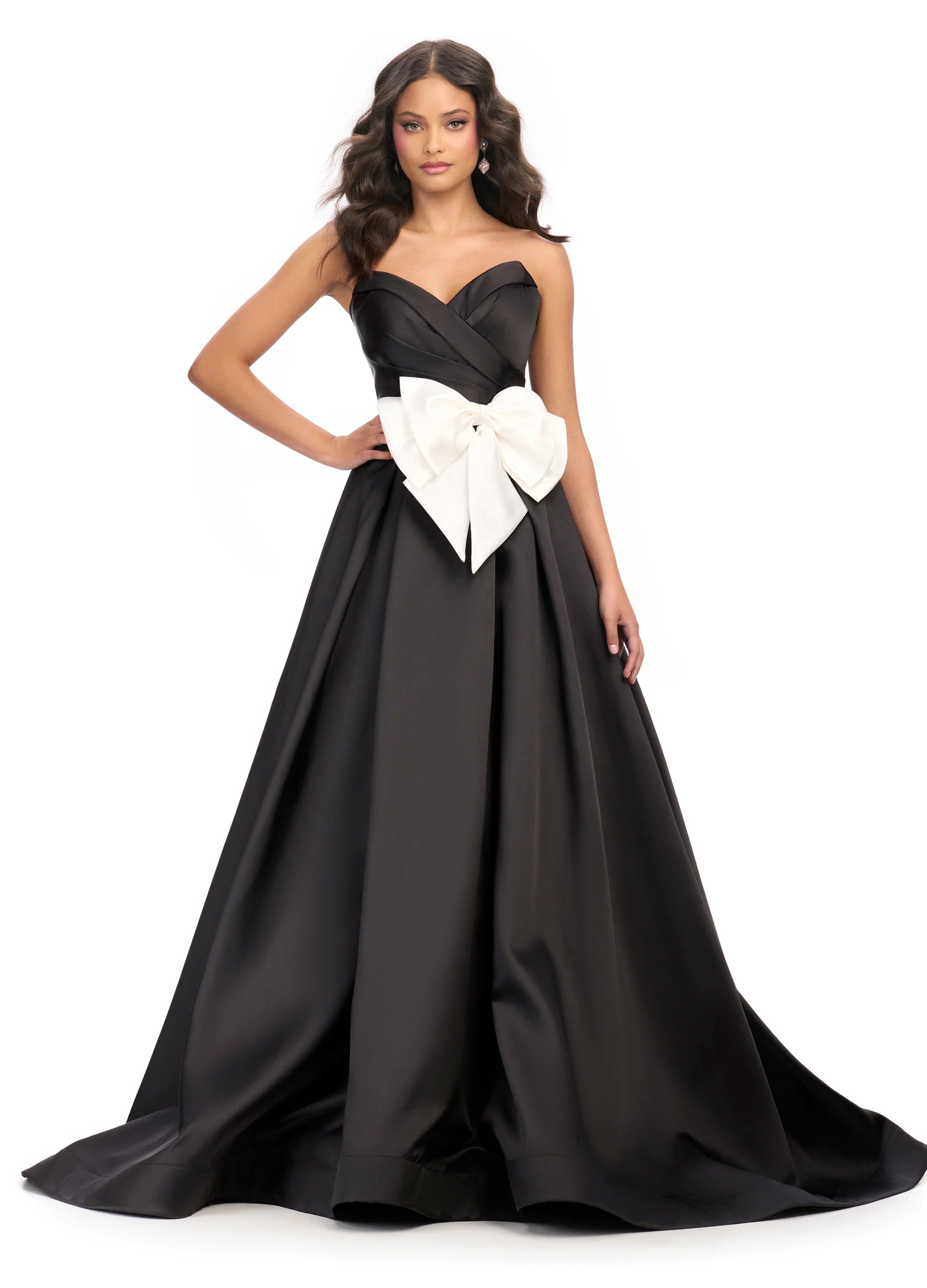 Expertly designed by Ashley Lauren, style 11770 strapless ballgown features a beautiful bow detail and sweetheart neckline. The perfect combination of elegance and style, this dress is a must-have for any formal occasion. Crafted with precision and attention to detail, it's sure to make you stand out.