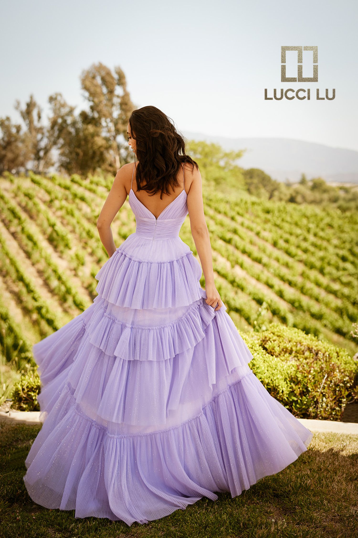 <p data-mce-fragment="1">Be the belle of the ball in the Lucci Lu 1357 Layer Tulle A Line Glitter Prom Dress. The V Neck and pleated ballgown combine for a stunning, flattering silhouette. Layered tulle adds volume, while the glitter detailing adds just the right amount of sparkle. Perfect for any formal event, this dress will make you shine.&nbsp;</p> <p data-mce-fragment="1">&nbsp;</p>