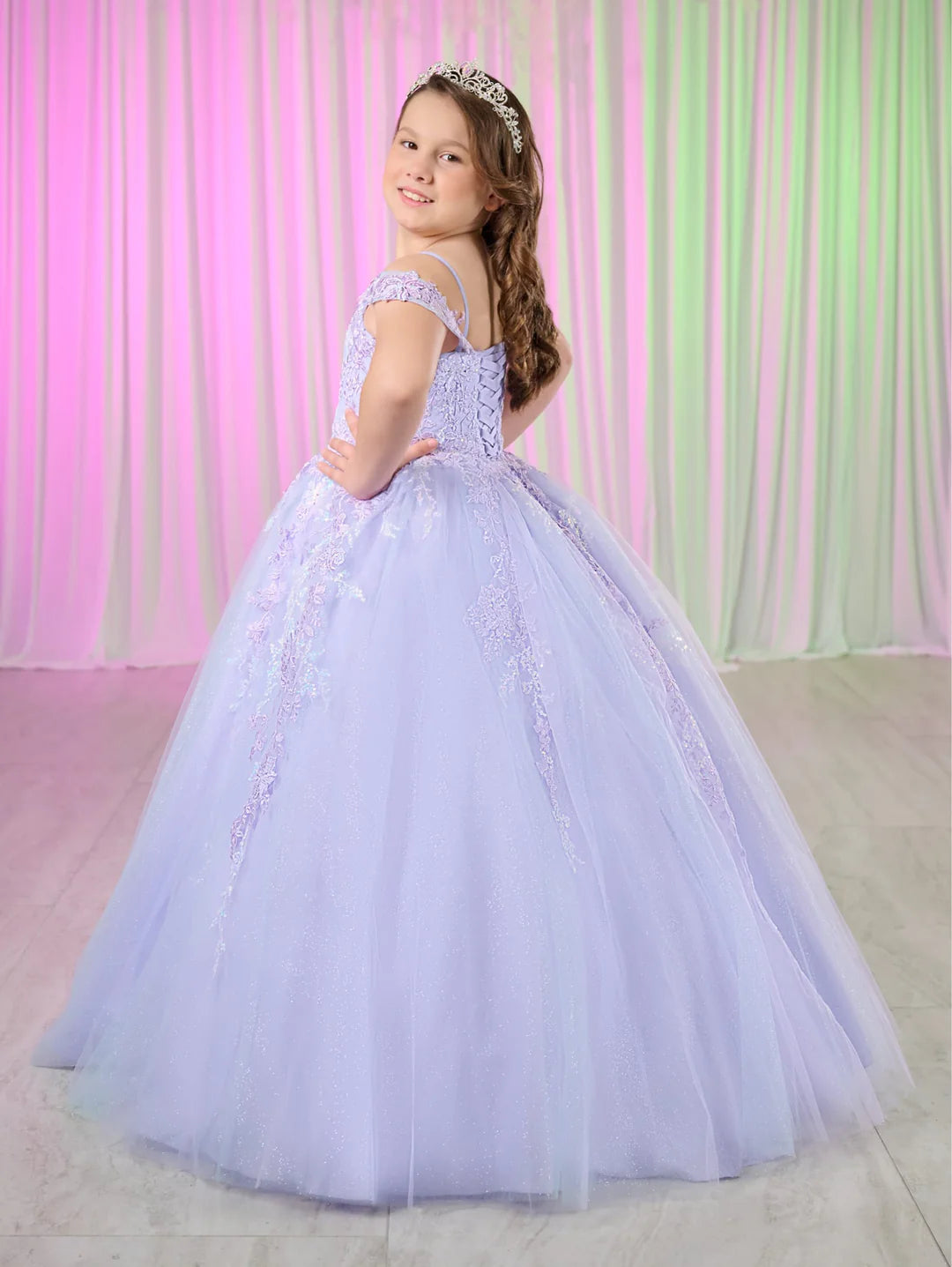 Expertly crafted with shimmering lace and delicate tulle, the Tiffany Princess 13760 dress is the perfect choice for any pageant occasion. The off the shoulder design and corset back add a touch of elegance, while the flowing tulle skirt adds a sense of movement. Make a statement with this stunning dress.