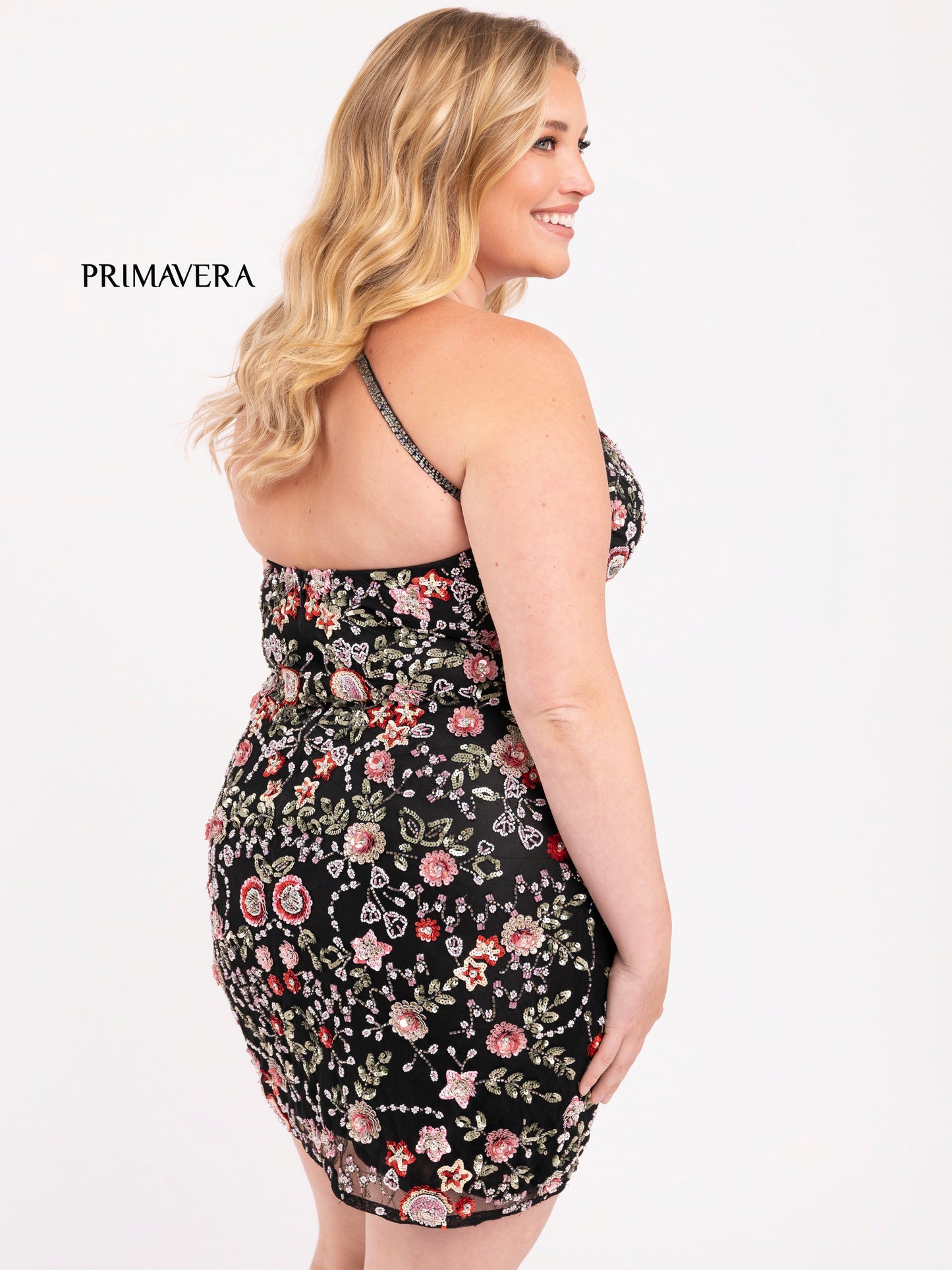 Primavera Couture 14034 Curvy Cocktail Dress Fully Embroidered Floral Print V-Neck Cross Back Curvy Short Homecoming Cocktail Dress. Look stunning in this elegant Primavera Couture 14034 V-neck dress. Crafted with embroidered floral print, sheer fabric and a cross-back design, this fitted dress is perfect for homecoming or cocktail events. With the right accessories, you will shine all night long.