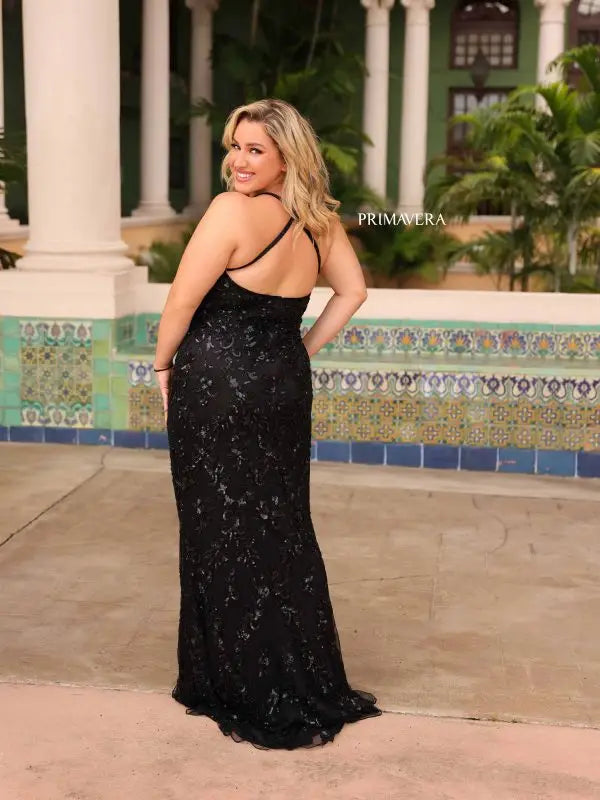 Elevate elegance with this Primavera Couture 14043 Long Prom Dress. Dazzling sequins, a fitted design, and criss-cross detailing accentuate your curves and add a touch of sparkle. The v-neckline elongates the neckline, making this gown perfect for formal events. Stand out from the crowd with this plus size beauty.