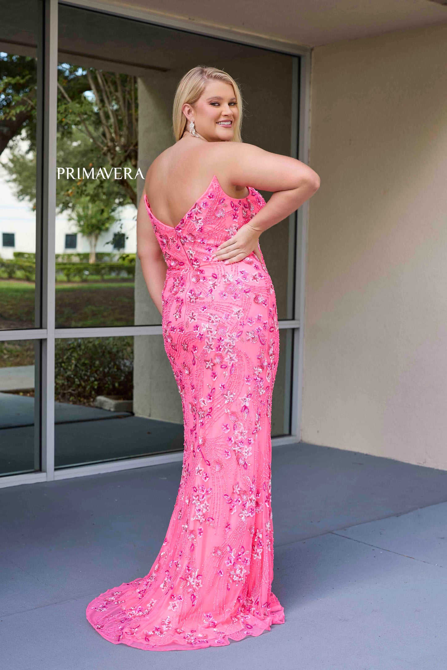 Experience elegance and comfort with the Primavera Couture 14080 Fitted Sequin Plus Size Prom Dress. Showcasing a flattering V-neck and strapless design, this formal gown will make you stand out at any event. The fitted sequin detailing adds just the right amount of sparkle, while the plus size fit ensures a perfect silhouette. Perfect for proms and formal occasions.

Sizes: 14W-24W

Colors: Black, Coral, Neon Pink