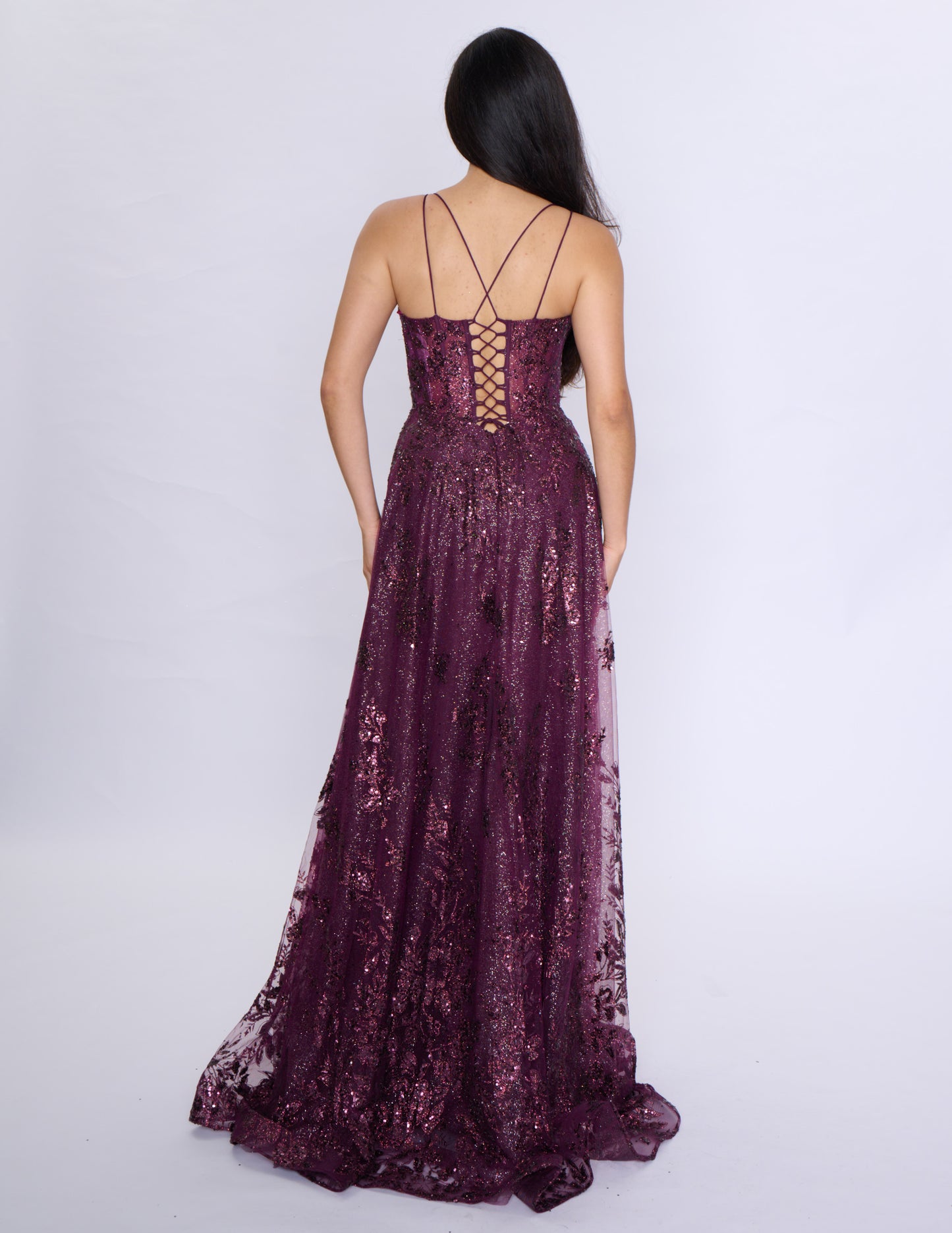 Shine at your prom with the Nina Canacci 1589 Sheer Sequin A Line Prom Dress. Featuring a corset bodice and a V-neckline, this formal evening gown will accentuate your figure. The sheer sequin fabric adds a touch of glamour to your look. Make a statement with this elegant and on-trend dress.

Sizes: 0-18

Colors: Sage, Rose Gold, Mulberry, Navy/Lilac