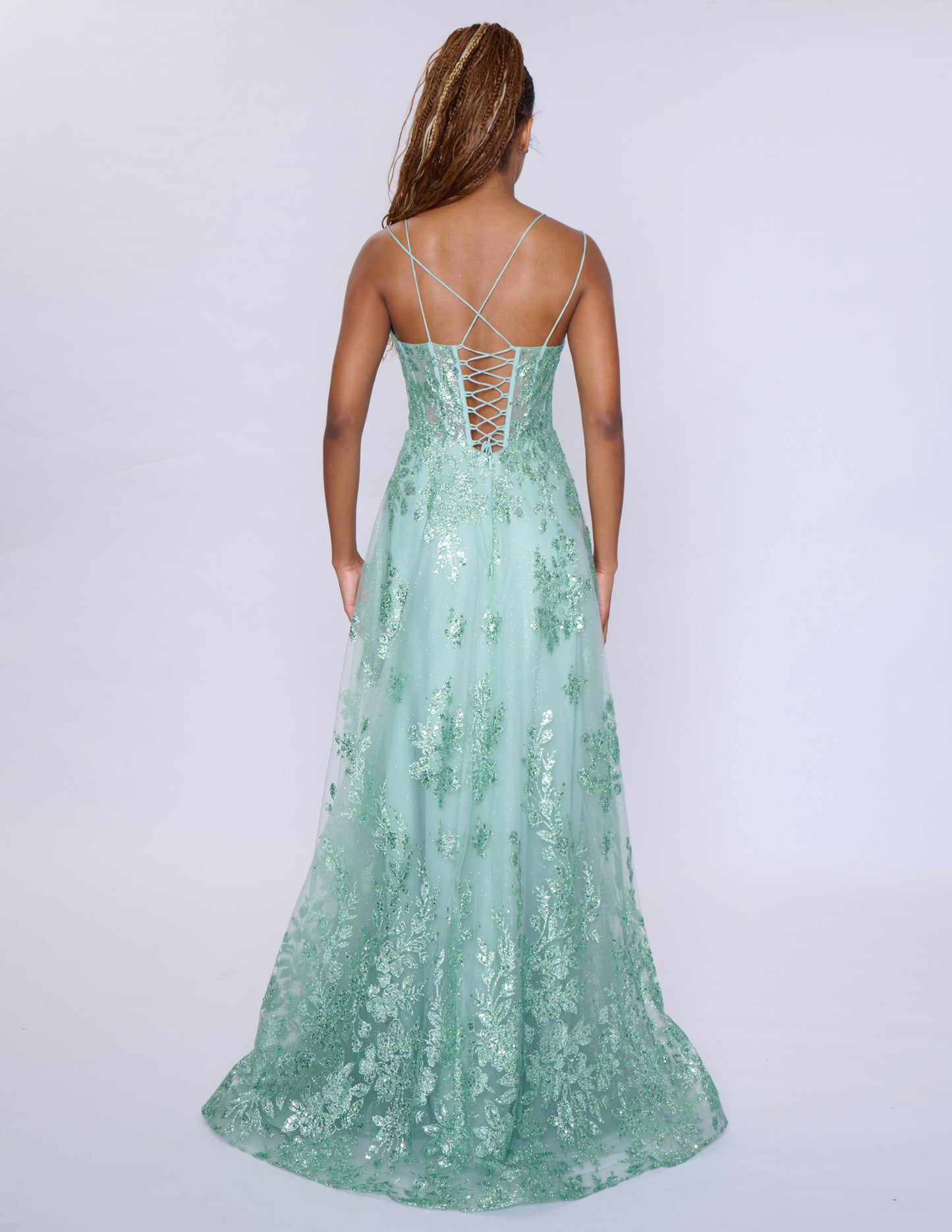 Shine at your prom with the Nina Canacci 1589 Sheer Sequin A Line Prom Dress. Featuring a corset bodice and a V-neckline, this formal evening gown will accentuate your figure. The sheer sequin fabric adds a touch of glamour to your look. Make a statement with this elegant and on-trend dress.

Sizes: 0-18

Colors: Sage, Rose Gold, Mulberry, Navy/Lilac