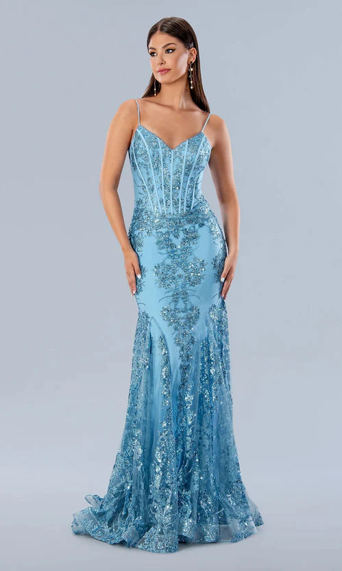 Stella Couture 21066 is a stunning V neckline glitter embellished fitted mermaid prom & Pageant Dress. Featuring a corset design bodice with boning and a v neckline. Lush mermaid silhouette with a sweeping train. sheer back. Great for Prom & Pageant  Available Size: 0-18  Available Color: Black, Blue, Emerald Green, Fuchsia, Gold, Lilac, Lipstick Navy, Pink, Royal, Silver