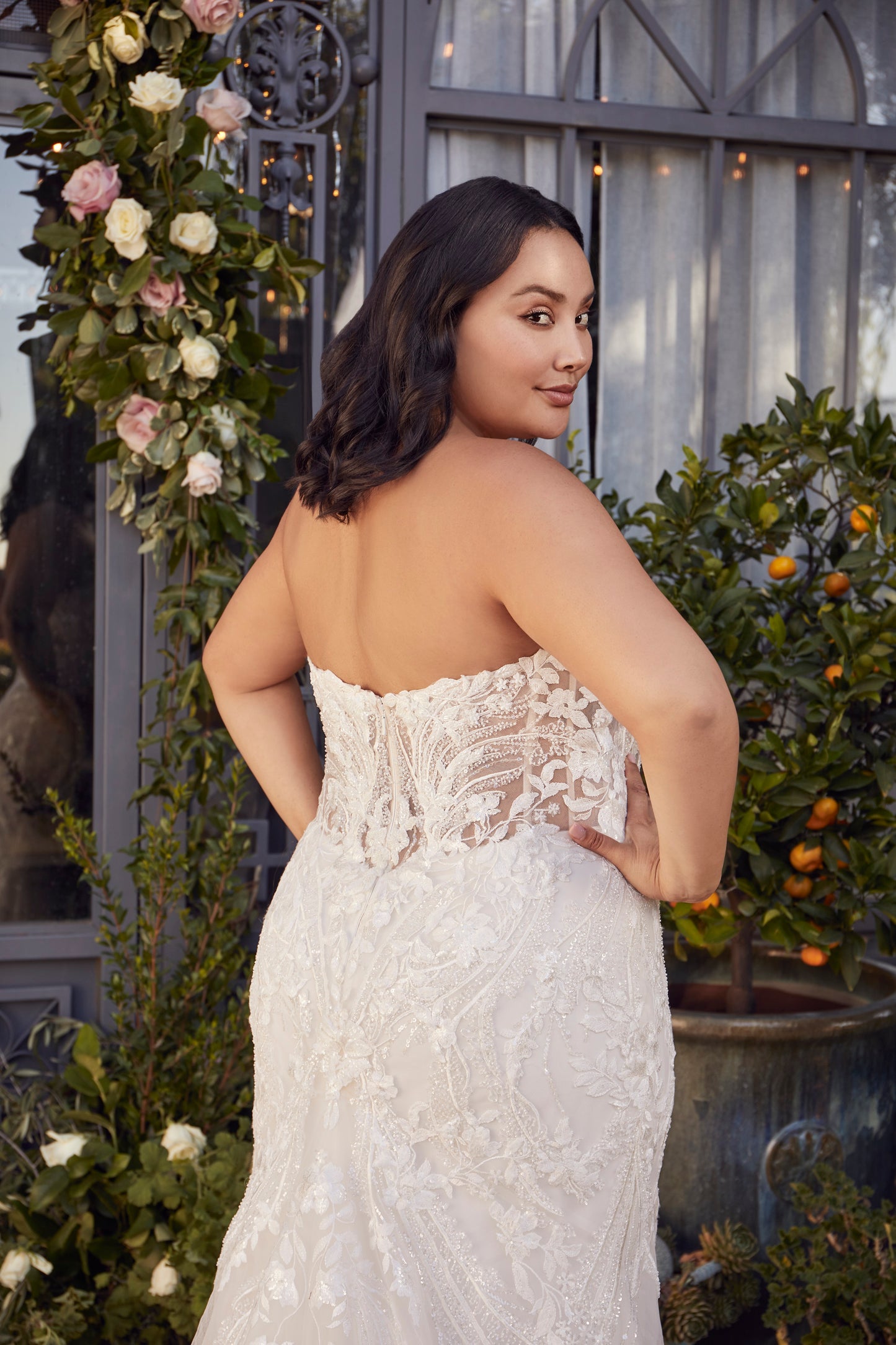 Indulge in luxury and grace with the Casablanca 2477 beaded mermaid wedding dress. The stunning long sleeve, strapless design is embellished with intricate beading, adding a touch of glamour to your special day. The fitted silhouette and elegant train will enhance your natural curves and leave you feeling like a true goddess. Artful and intricate, Style 2477 Delaney by Casablanca Bridal embodies storybook romance. Delicate lace, sequins, and beading sculpt the sweetheart neckline of this strapless fit and f