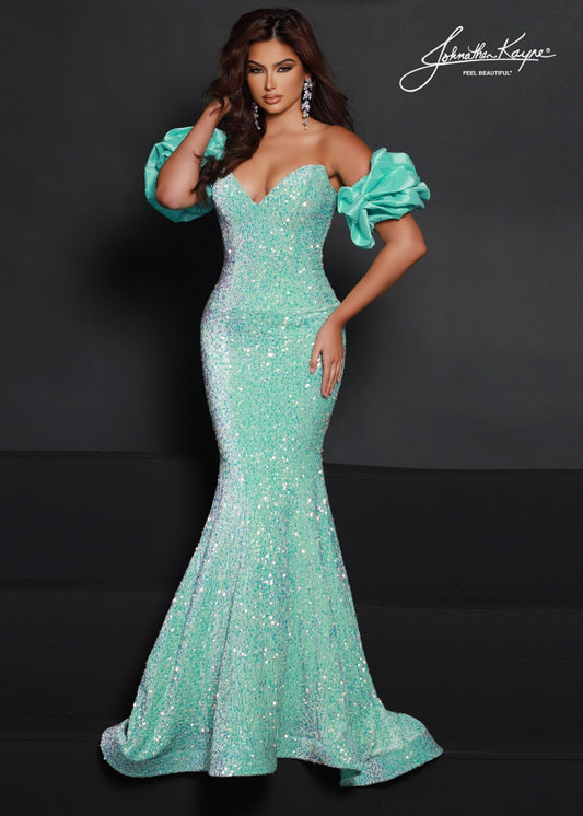 Johnathan Kayne 2641 Long Velvet Sequin Mermaid Prom Dress Puff Sleeve Pageant Gown One and DONE. This dress is everything. The dazzling sparkle of the sequin stretch velvet will light up the night for this mermaid gown. The removeable puff sleeves finish this sensational look. The corset built inside gives your the perfect fit.  Sizes: 00-24  Colors: Aqua, Cotton Candy, Royal, Ruby, Seafoam, Black