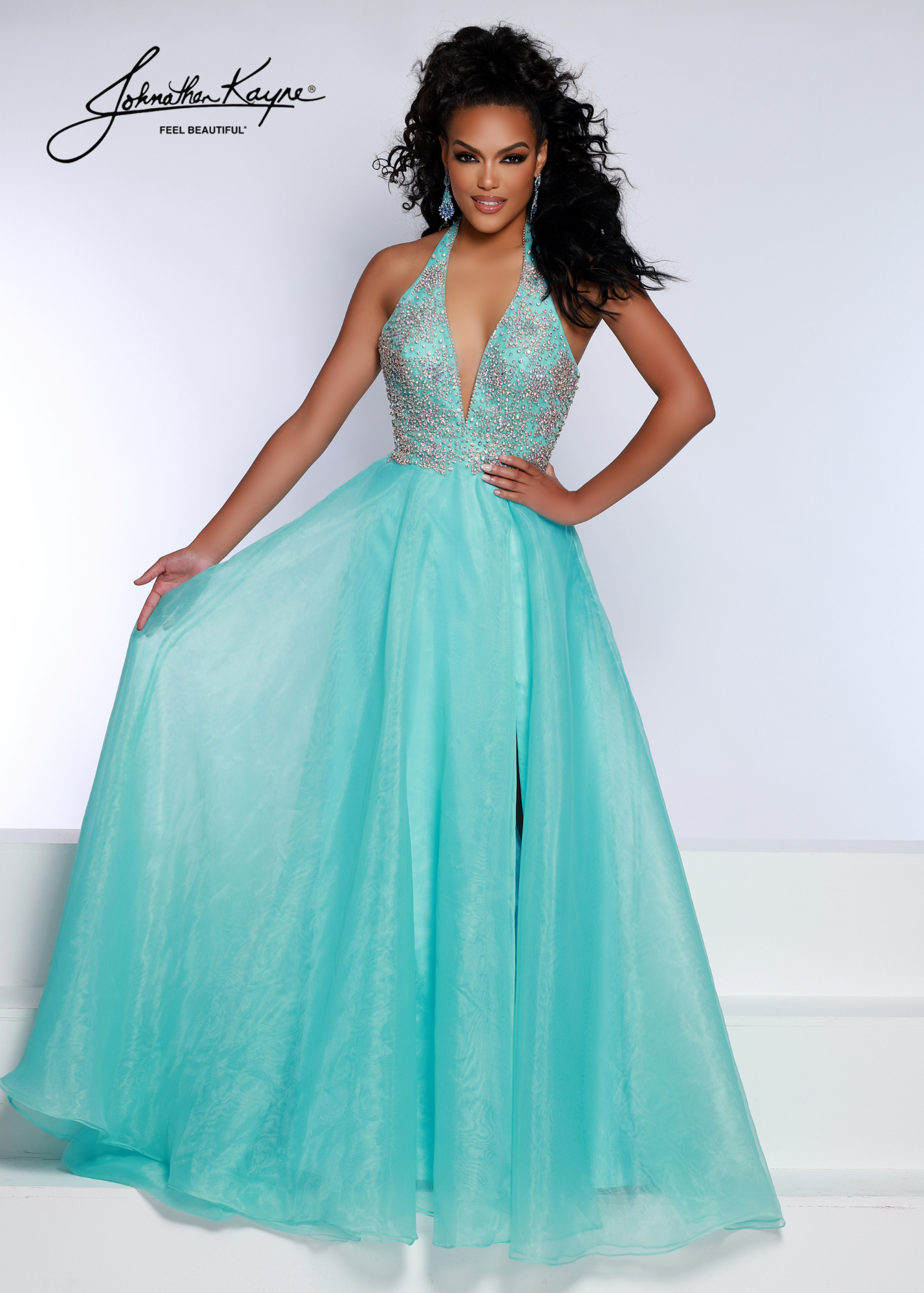 Johnathan Kayne 2676 A Line Halter Maxi Slit Prom Dress Backless Pageant Gown Crystal Grace the stage in this divine A-line! This organza gown features a hand beaded halter bodice with a deep plunge for a touch of modern sophistication.  Sizes: 00-16  Colors: Aqua, Neon Pink