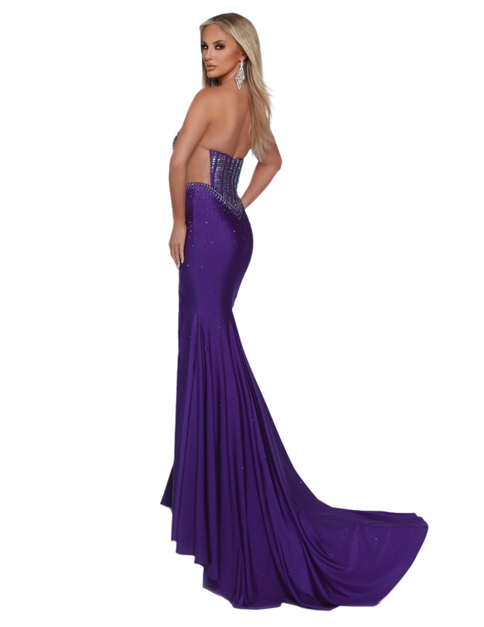 The Johnathan Kayne 3001 Sheer Cut out Crystal Slit Prom Dress is designed to make you stand out at any formal event. With a plunging neckline and sheer cutouts, this dress will highlight your figure while the crystal embellishments add a touch of glamour. Perfect for proms, pageants, and other special occasions. Get ready to slay the prom game in this strapless beauty featuring a daring plunge and flattering mesh cutouts. Whether you're striking a pose or dancing, this dress has just the right amount of pi