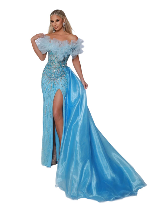 This Johnathan Kayne 3057 dress boasts a beaded corset, an elegant overskirt, and an off-the-shoulder, puff sleeve design. Perfect for prom or pageants, this dress exudes class and sophistication while highlighting your figure. The intricate beading adds a touch of sparkle, making you stand out in any crowd. Strive for fabulous in this dazzling beaded dress! Featuring delicate organza, stretch lace, and a fearless leg slit, its strapless design dazzles with off-the-shoulder flares and an attached hip cape. 