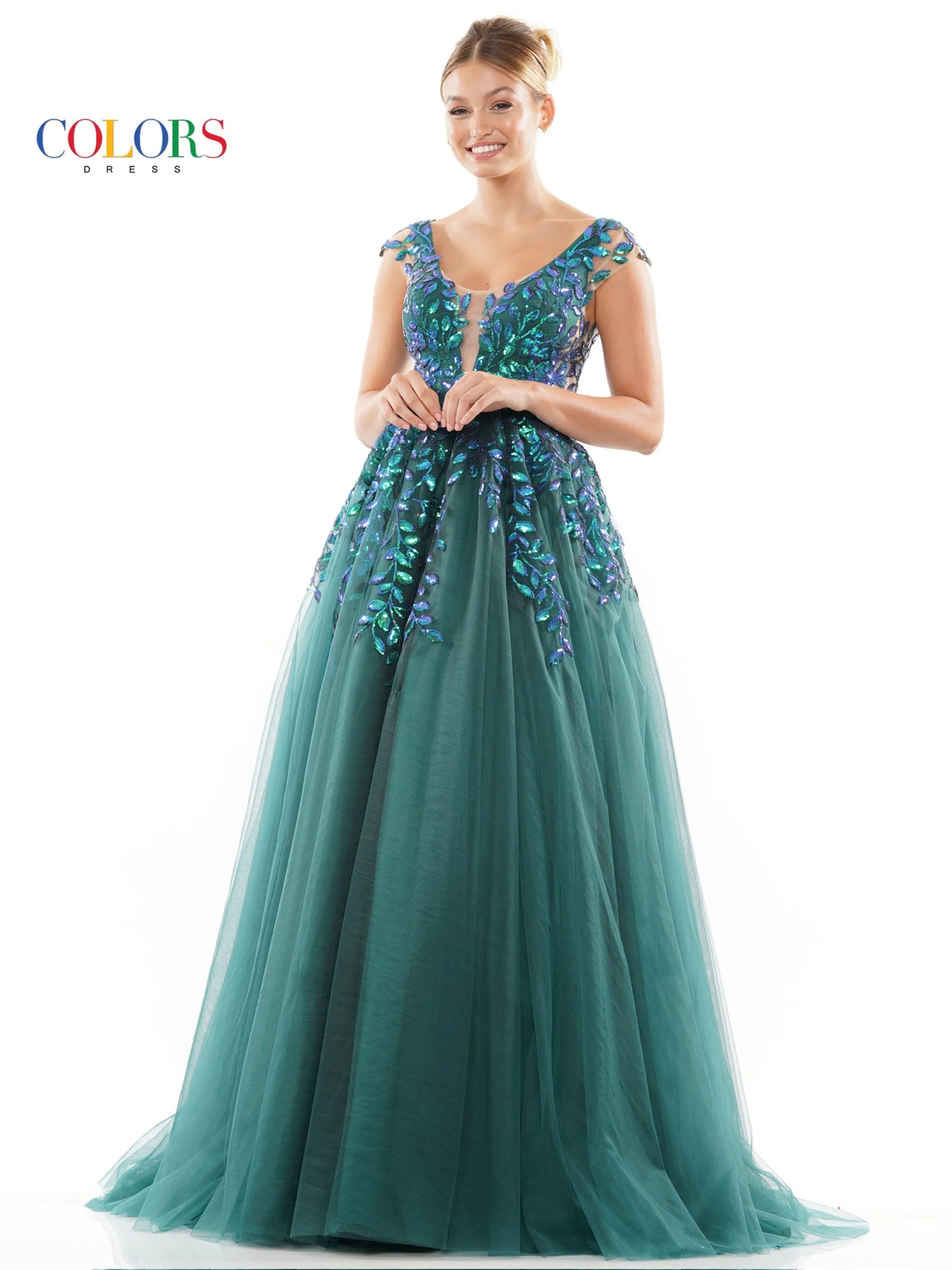 With sheer side panels, the Colors Dress 3239 ballgown offers a touch of elegance to your prom or pageant look. The sheer sequin lace adds a subtle shimmer, making you stand out in the crowd. Available in plus sizes, this formal gown is perfect for any special occasion.  Sizes: 0-22  Colors: Light Blue, Off White, Deep Green, Hot Pink