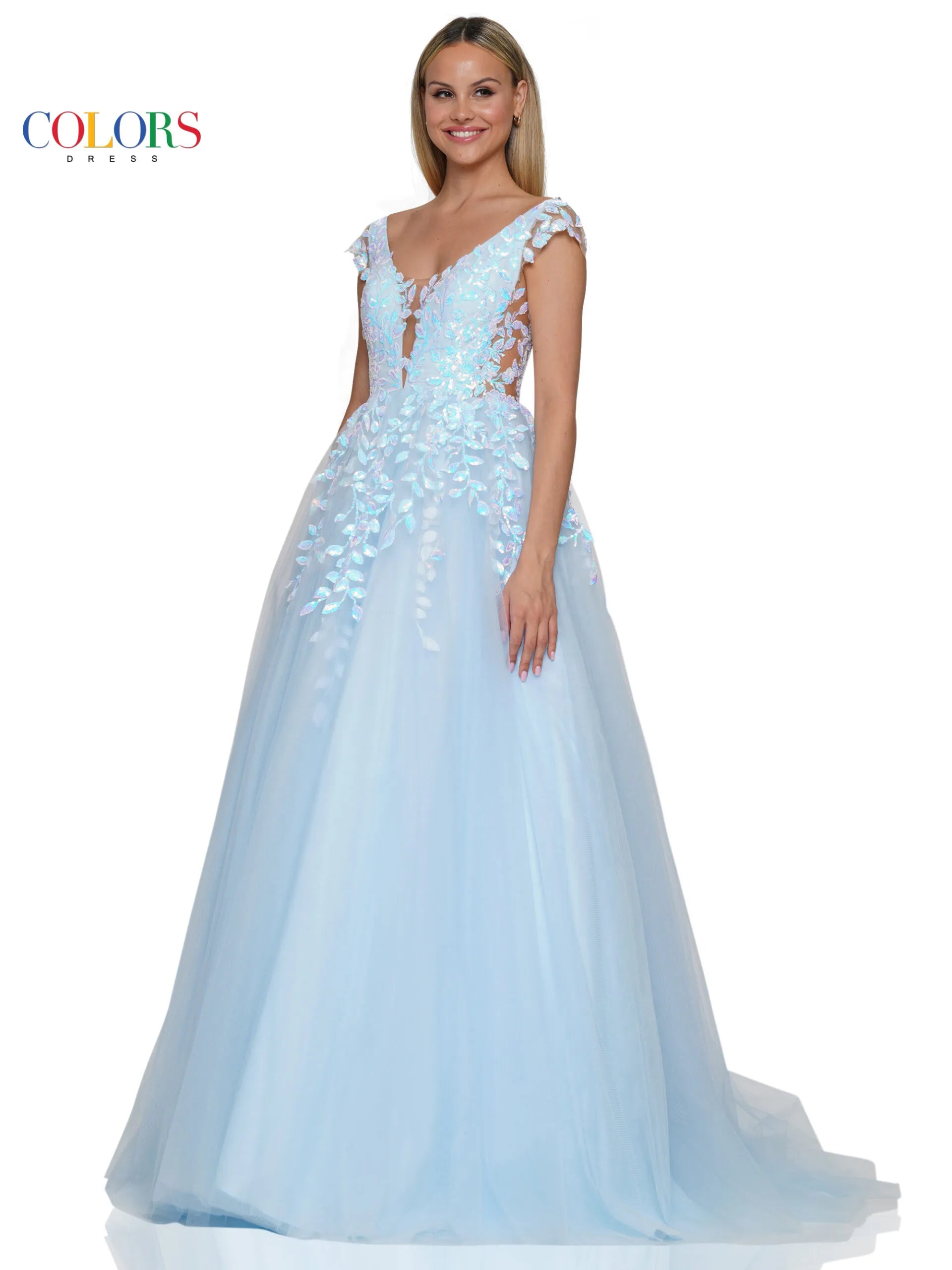 With sheer side panels, the Colors Dress 3239 ballgown offers a touch of elegance to your prom or pageant look. The sheer sequin lace adds a subtle shimmer, making you stand out in the crowd. Available in plus sizes, this formal gown is perfect for any special occasion.  Sizes: 0-22  Colors: Light Blue, Off White, Deep Green, Hot Pink