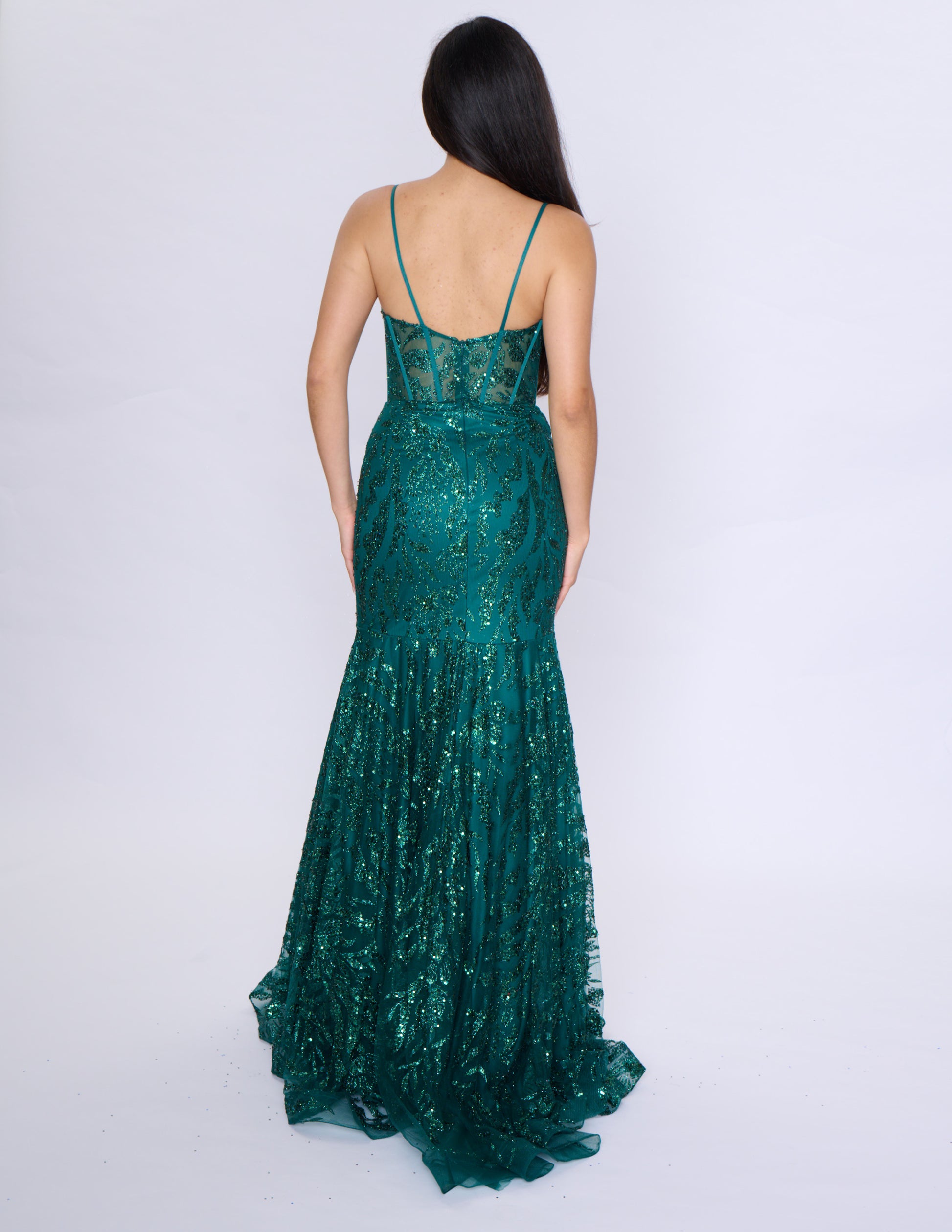 Enhance your prom look with this stunning Nina Canacci 3277 prom dress. The sheer corset beautifully accentuates your curves, while the mermaid silhouette elongates your figure. The sparkling sequin details and V-neckline add a touch of glamour. Make a statement with this formal gown and shine at your special event.

Size: 14

Color: Hunter Green