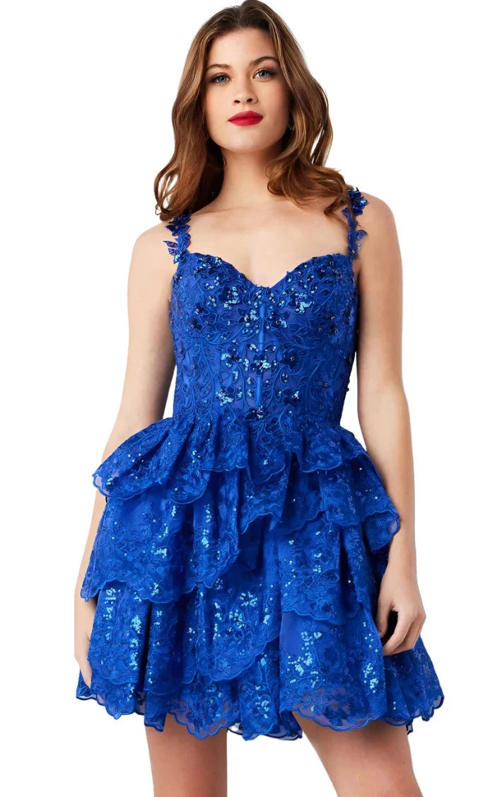 Upgrade your homecoming style with the Jovani 37080 Short Lace Ruffle Dress. The sequin embellished lace corset and asymmetrical layered short skirt create a chic silhouette, perfect for a night out. Stand out in this elegant and trendy cocktail dress. This Cocktail Dress is perfect for any formal occasion!  Sizes: 00-24  Colors: Black, Hot Pink, Ivory, Light Blue, Light Pink, Olive, Red, Royal