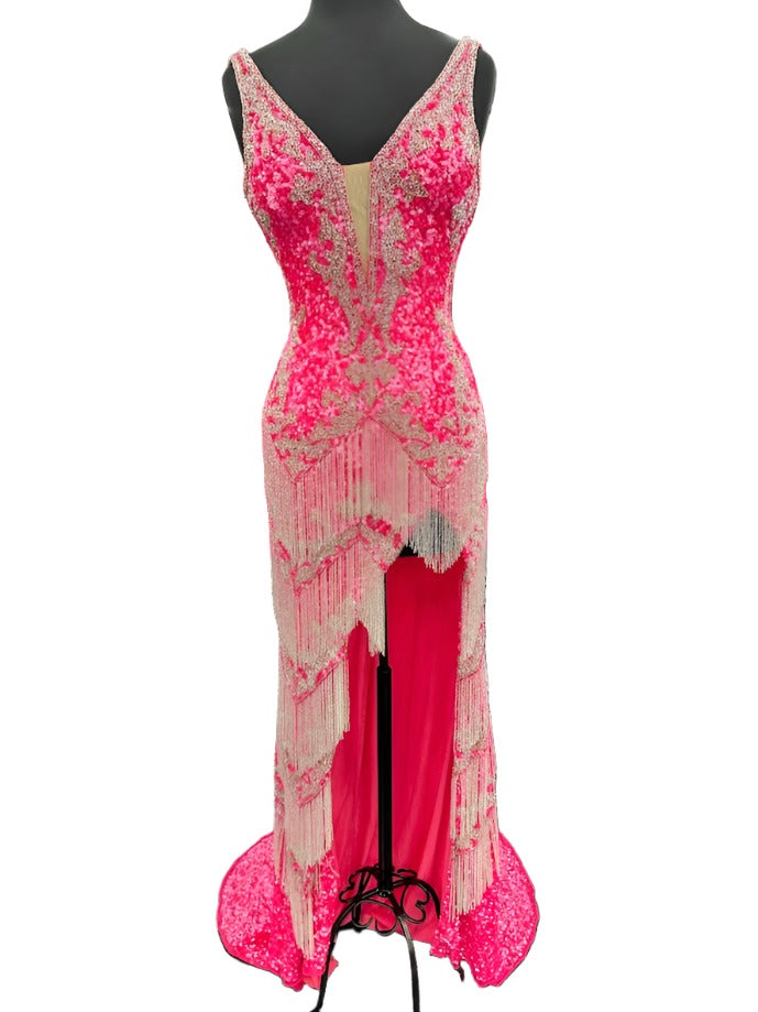 The Jovani 38847 Prom Dress is a stunning gown that exudes elegance and glamour. Made with exquisite sequin beading and delicate fringe details, this dress will make you feel like a star on any special occasion. Featuring a sexy slit and a flattering V-neckline, it's the perfect choice for proms, pageants, and formal events. Look and feel your best with this one-of-a-kind dress.