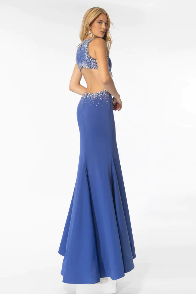 Elevate your prom look with the Ava Presley 39237 Long Prom Dress. The open back, cut out design, and high slit adds a touch of drama while the beaded detailing gives it a glamorous touch. Perfect for formal events and pageants.