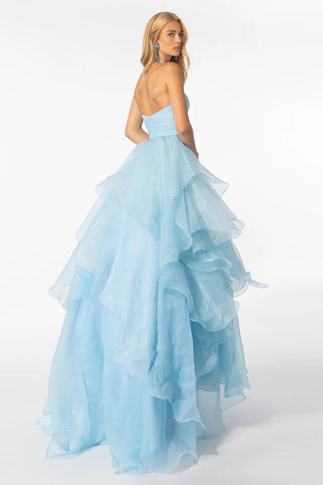 Elevate your look in the Ava Presley 39560 Long Prom Dress. This stunning halter gown features a layered organza skirt, perfect for formal events and pageants. With its luxurious design and flattering silhouette, you are sure to make a statement.