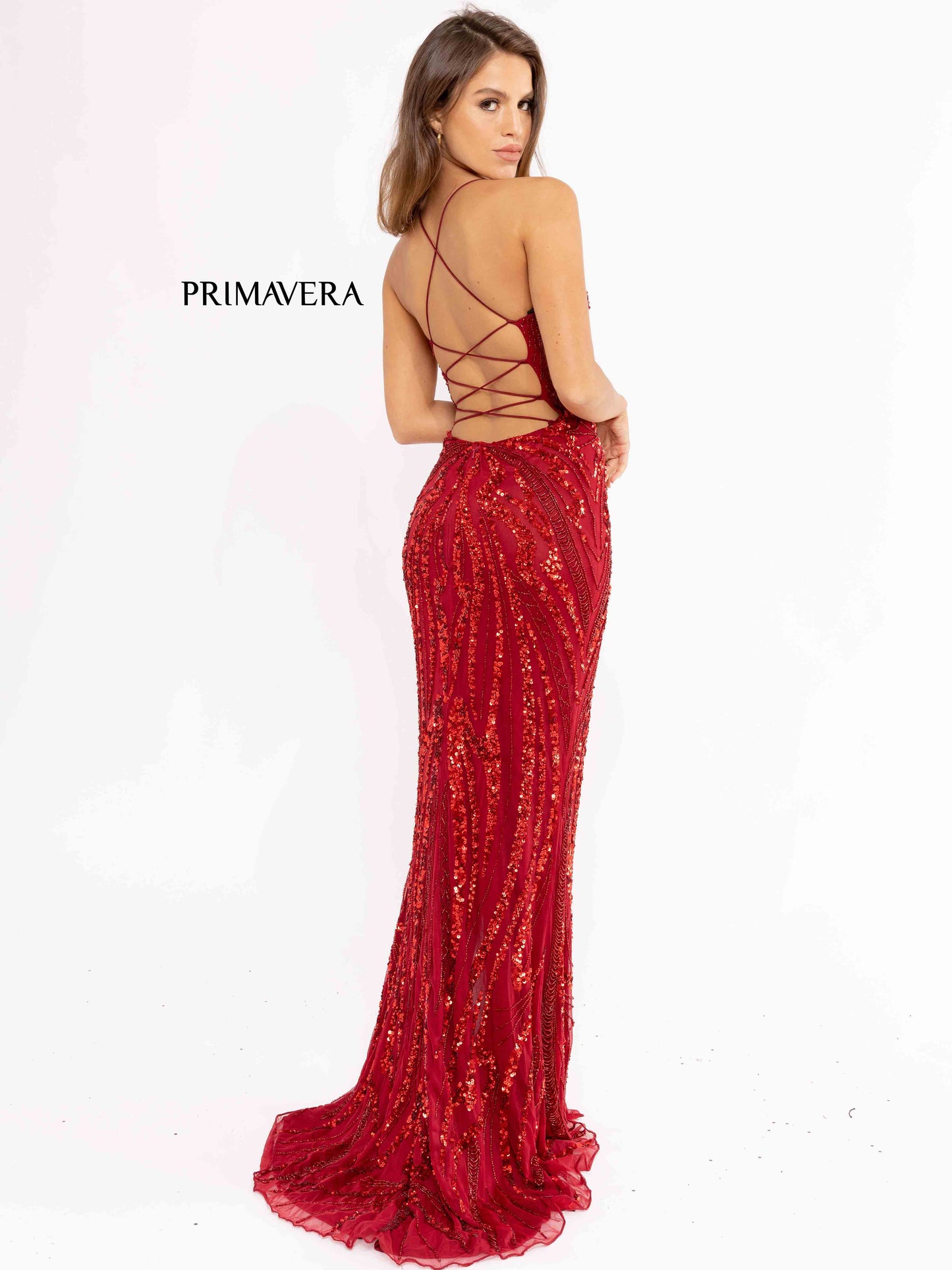 Primavera Couture 3958 Prom Dress Long beaded Gown. Its has a slit and a beautiful design on the gown.