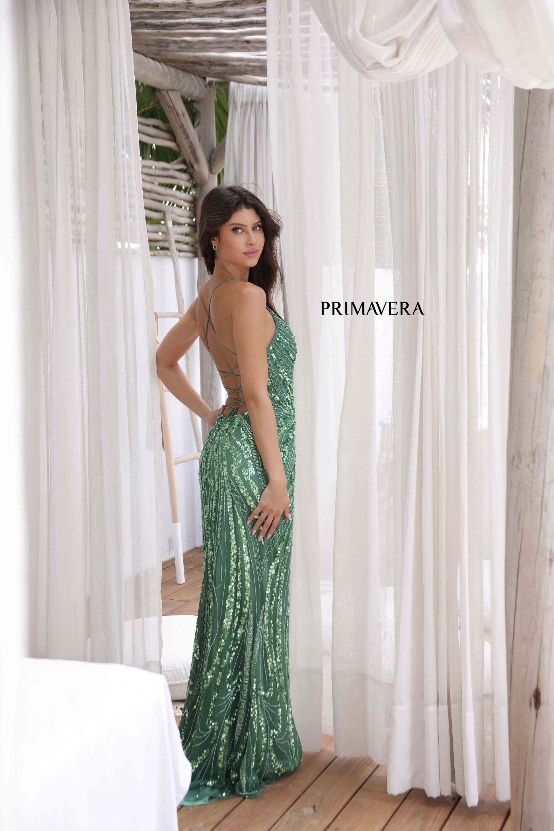 Primavera Couture 3958 Prom Dress Long beaded Gown. Its has a slit and a beautiful design on the gown.