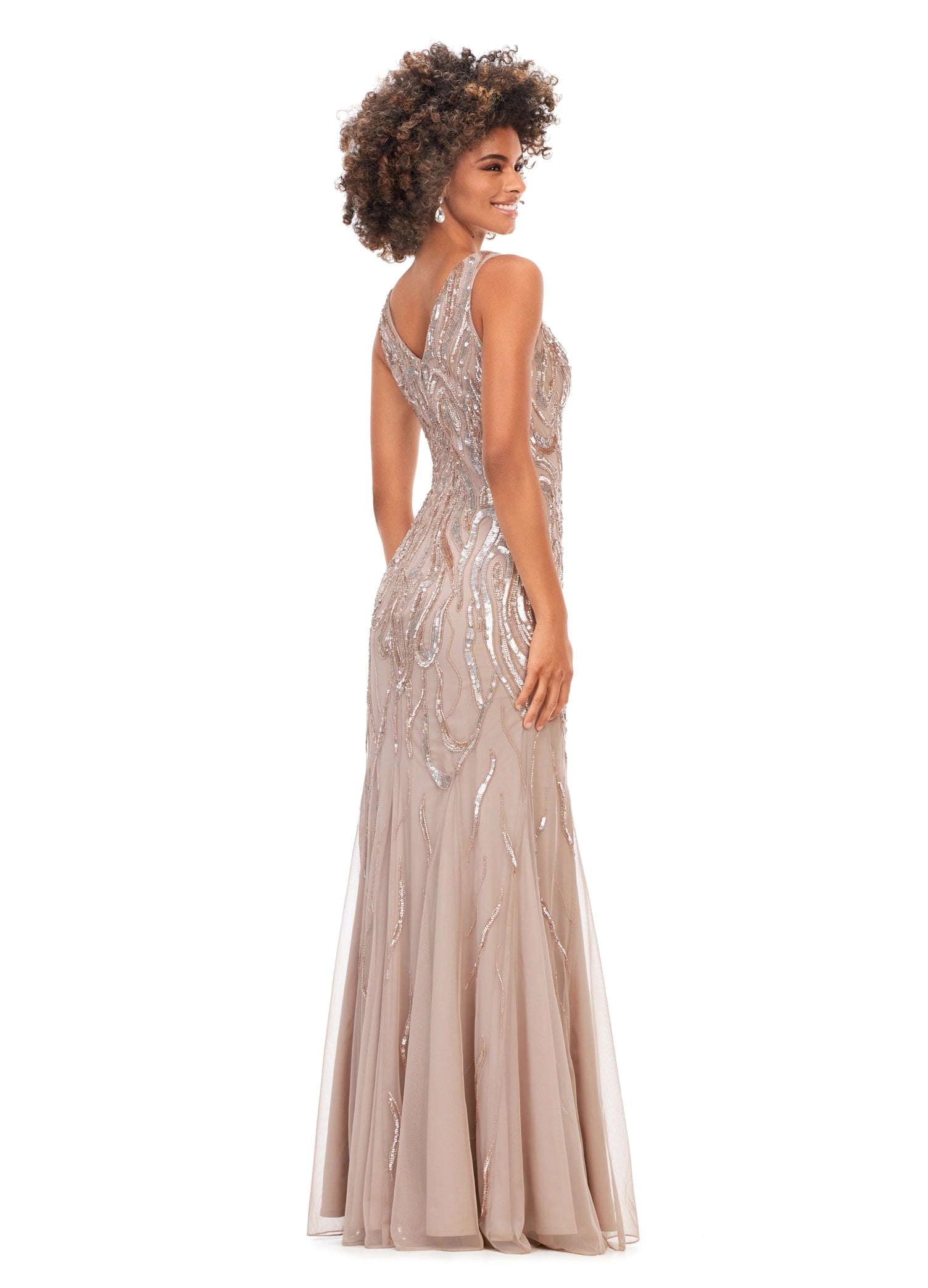 Ashley Lauren 11204 V-Neck Sequin V-Back Hand Beaded Sheer Long Evening Dress. This classic fitted gown features a v-neckline, v-back and a flattering bead pattern.