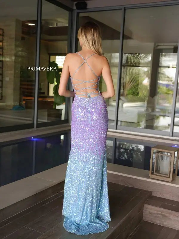 Elevate your prom look with the Primavera Couture 4102 Long Prom Dress. The ombre sequin corset adds a touch of glamour, while the fitted scoop neck and high slit offer a flattering silhouette. Perfect for formal events and pageants. Stand out with style and comfort.