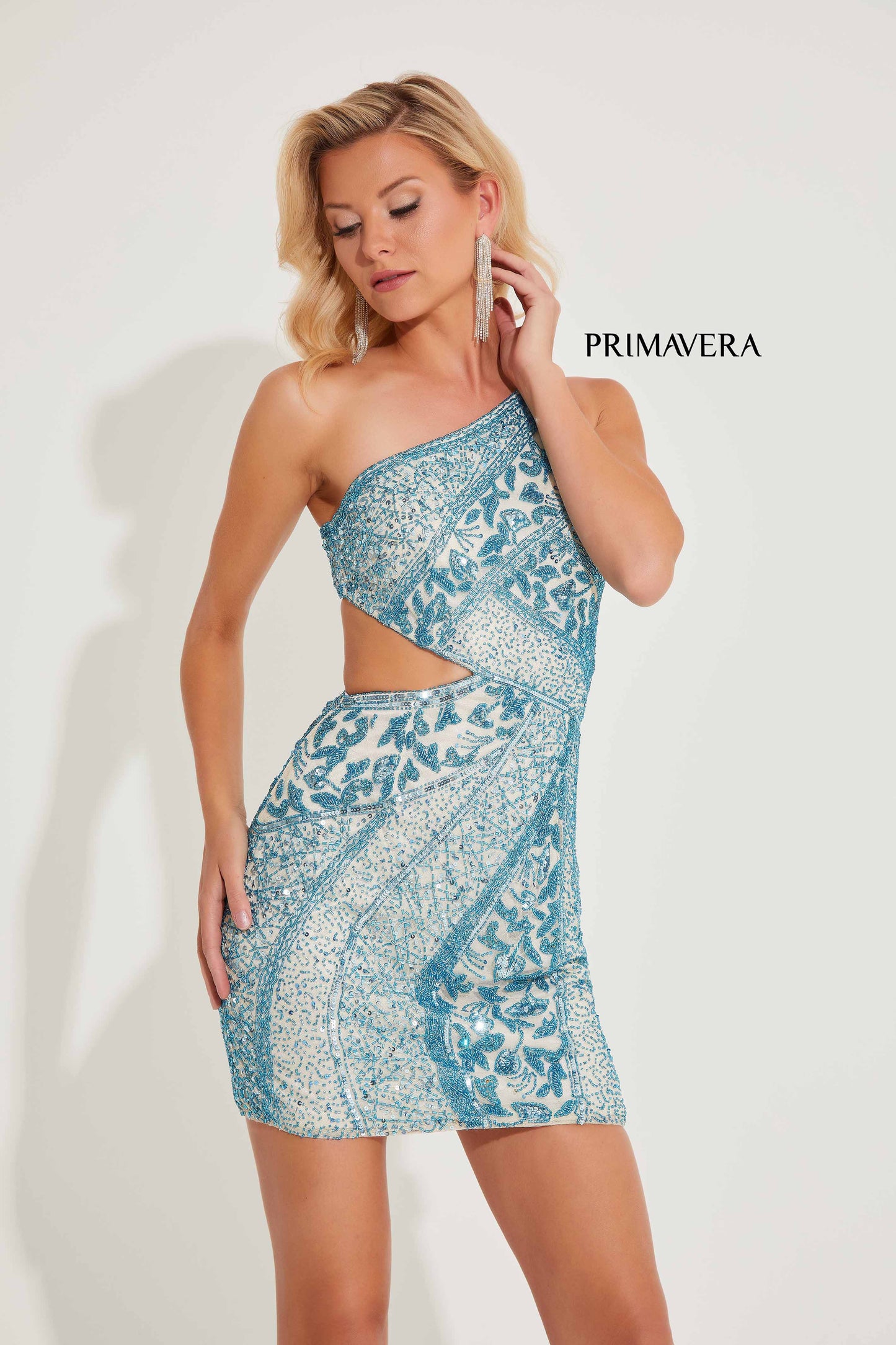 Expertly crafted with intricate beading and a unique cut out one shoulder design, the Primavera Couture 4228 Short Beaded Homecoming Dress is the perfect choice for your next cocktail event. Its stunning details and flattering silhouette will make you stand out in any crowd. Elevate your style with this elegant and modern dress.