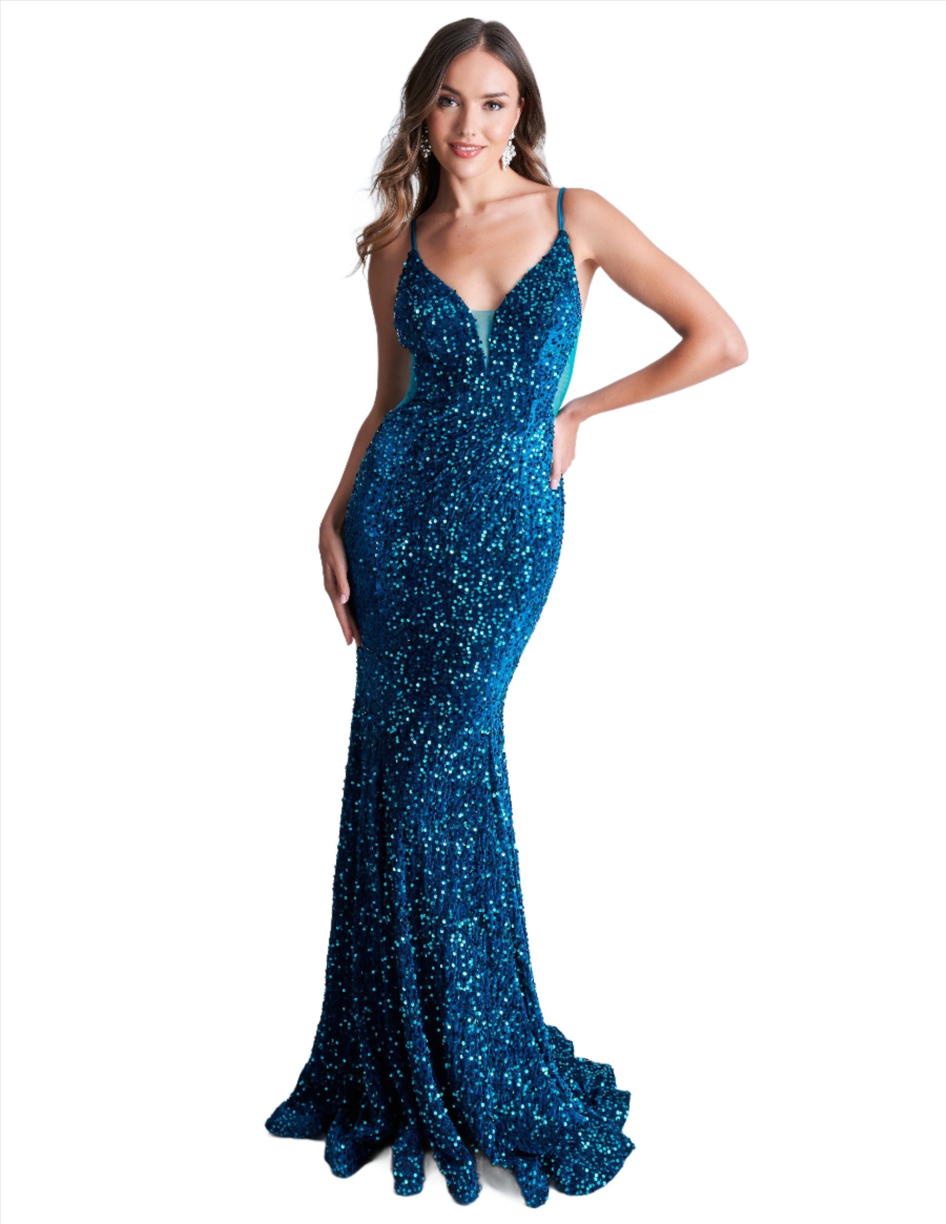 Elevate your style with the Nina Canacci 4420 Velvet Sequin Mermaid Prom Dress. Featuring a striking sheer v-neckline and stunning velvet sequin design, this formal evening gown is sure to make a statement. With its flattering mermaid silhouette, it's the perfect choice for a prom or special occasion.