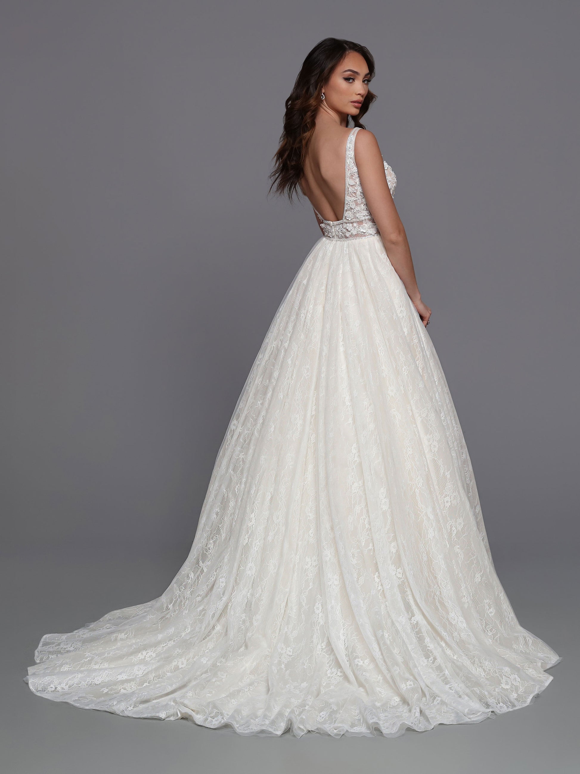 Davinci Bridal 50726 A-Line Ballgown Lace Applique Open Back Train Sequins Wedding Gown. Layers of gathered tulle in the skirt contrast with the beaded lace bodice of this A-line dress with its open back and wide empire-style waistband.