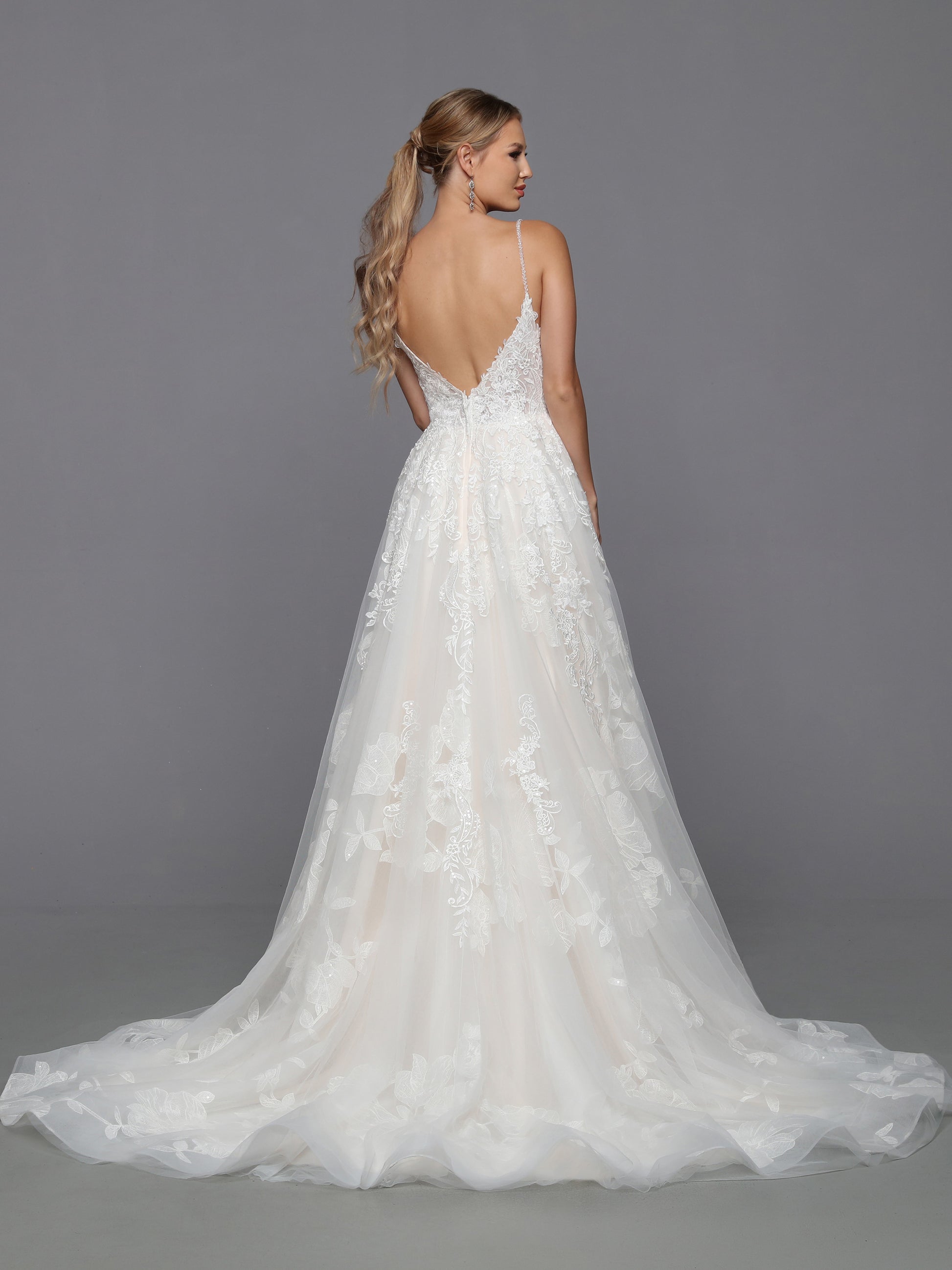 DaVinci Bridal 50768 A-Line Ballgown Floral Lace Deep V-Neck Open Back Spaghetti Straps Wedding Gown. A deep V-back, oversize floral lace, and delicate beaded lace applique add textured interest to this pretty ball gown with its slip dress bodice, sparkling shoulder straps, and wavy hemline. This dress is available with an optional matching veil.